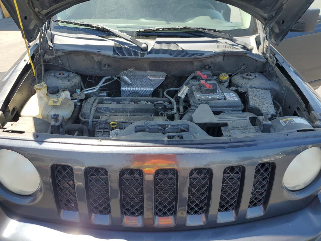 2014 Jeep Patriot Sport Charcoal vin: 1C4NJPBA1ED753926 Damage: Left Head Lamp, Faded, Repair Required