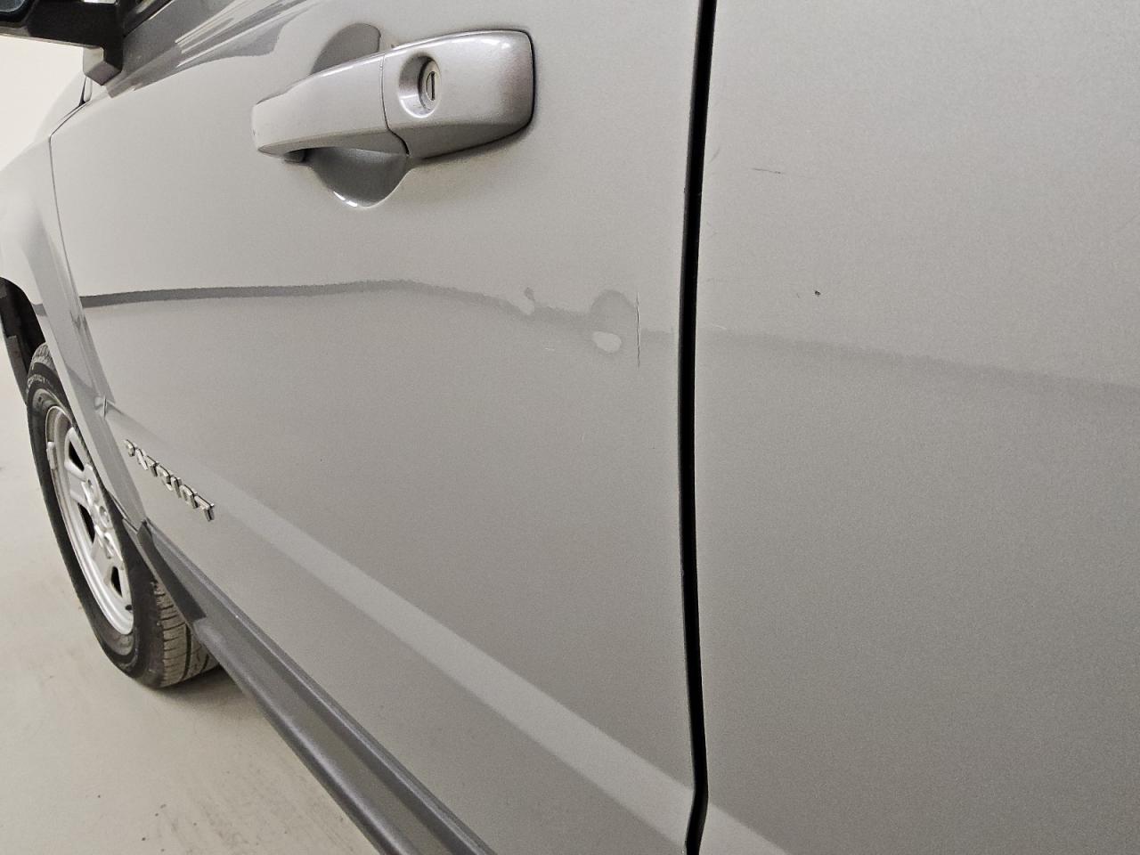 2015 Jeep Patriot Sport Silver vin: 1C4NJPBA2FD325560 Damage: Left Front Door, Multiple Dents/Paint Damage, 2