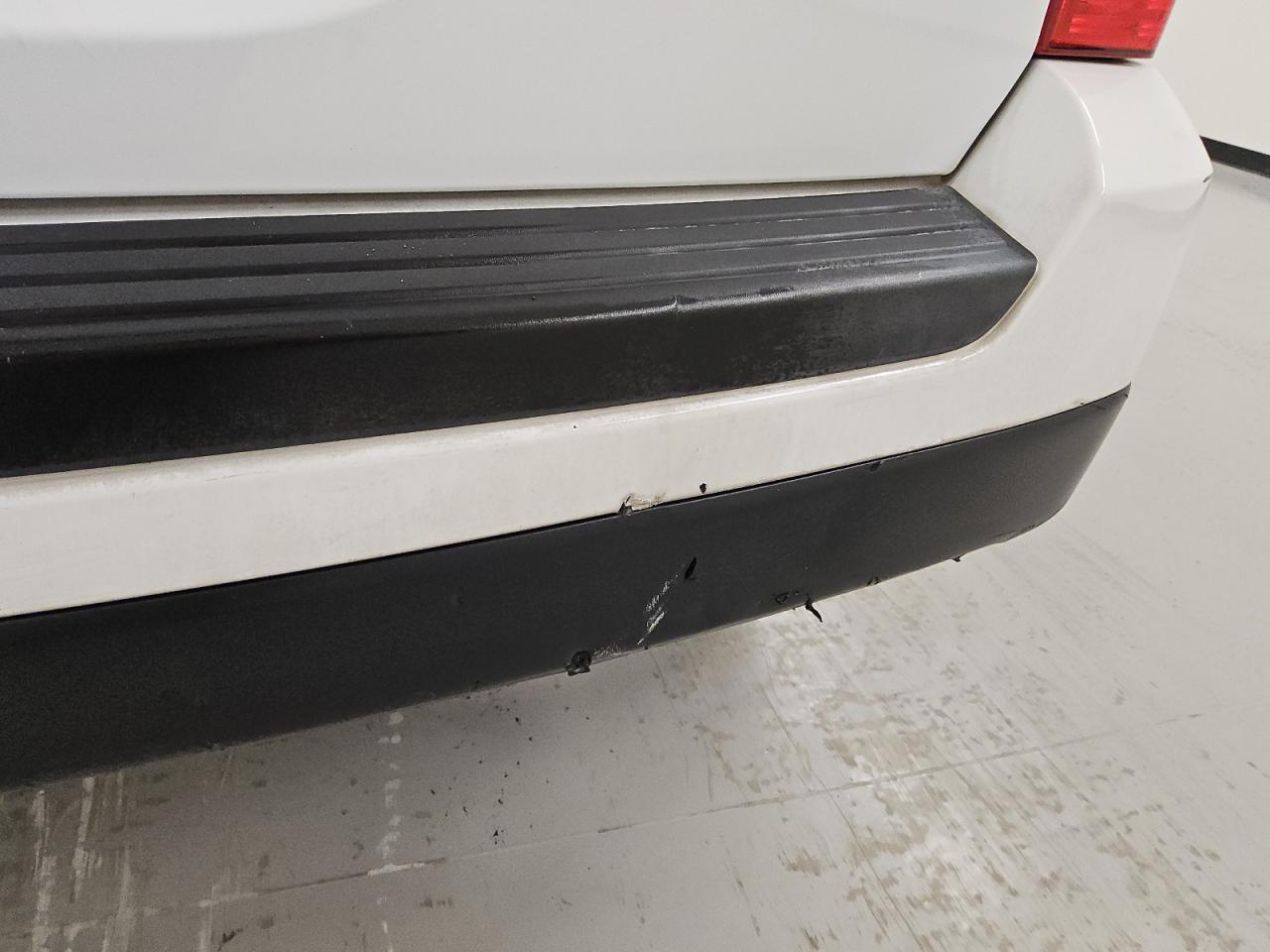 2015 Jeep Patriot Sport White vin: 1C4NJPBB1FD264405 Damage: Rear Bumper, Gouged, 4 To 5 Inches