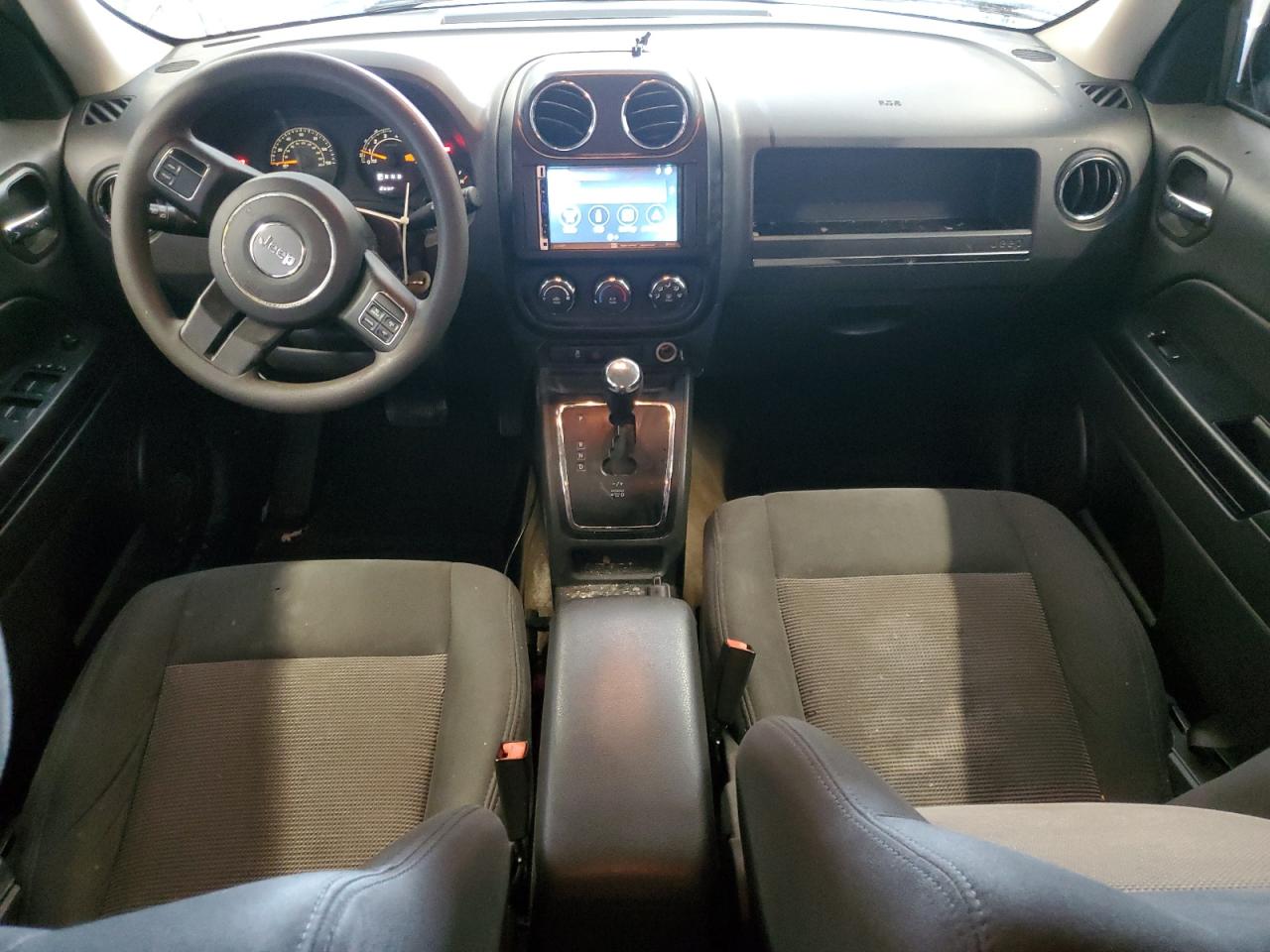 2015 Jeep Partroit Green vin: 1C4NJPBB3FD414093 Damage: Right Front Seat Cushion, Stained, Permanent