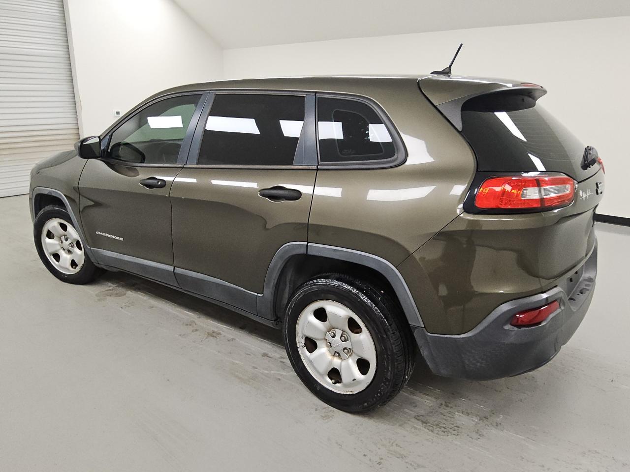 2014 Jeep Cherokee Sport Green vin: 1C4PJLAB9EW301576 Damage: Left Qtr Panel, Dent(S) W/ Paint Dmg, 1 To 2 Inches