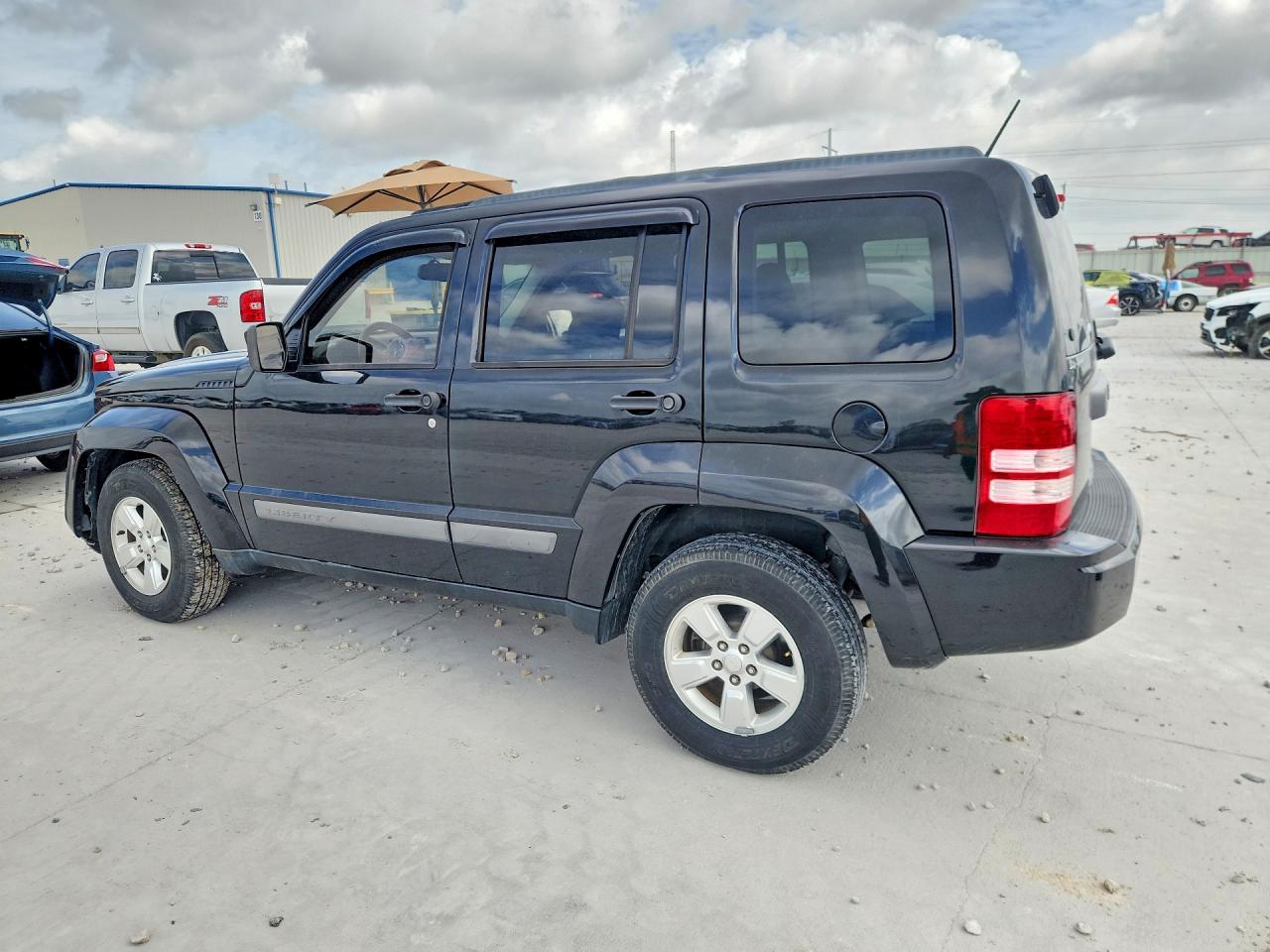 2012 Jeep Liberty Sport Black vin: 1C4PJLAK0CW147272
