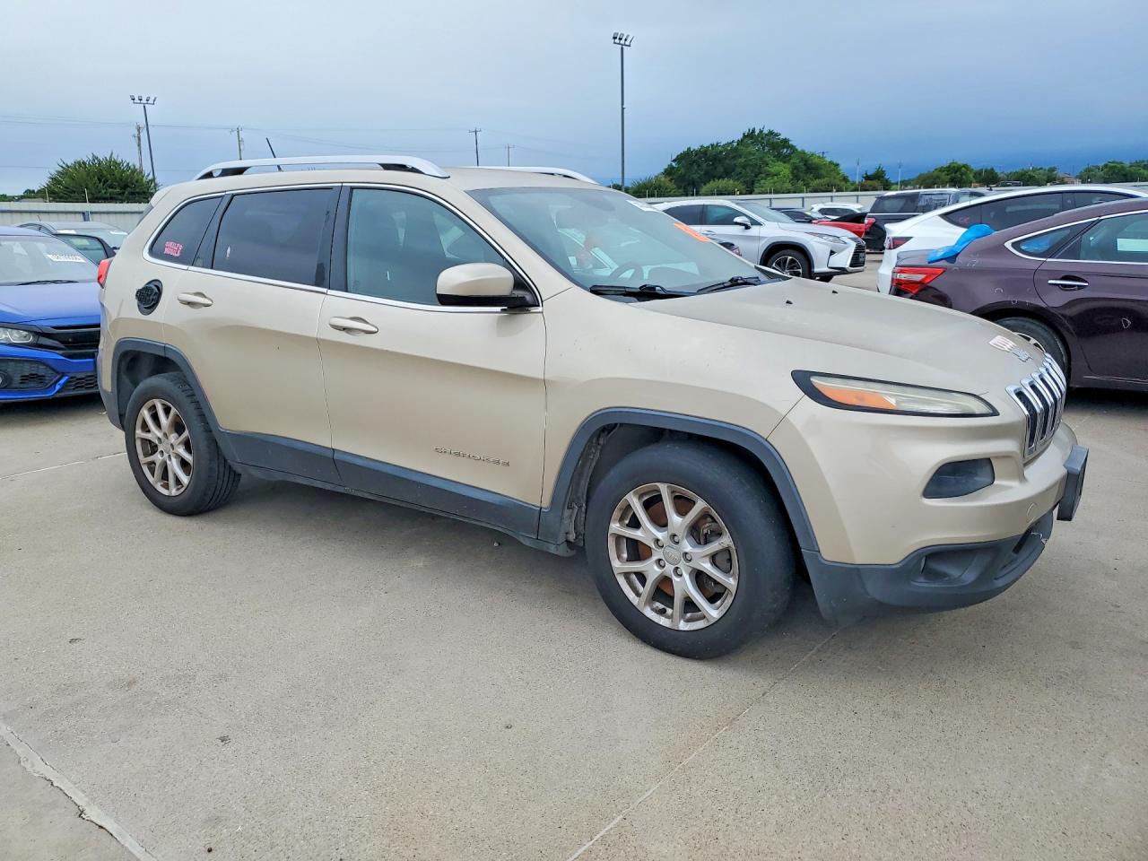 2014 Jeep Cherokee Latitude Золотой vin: 1C4PJLCS2EW297397