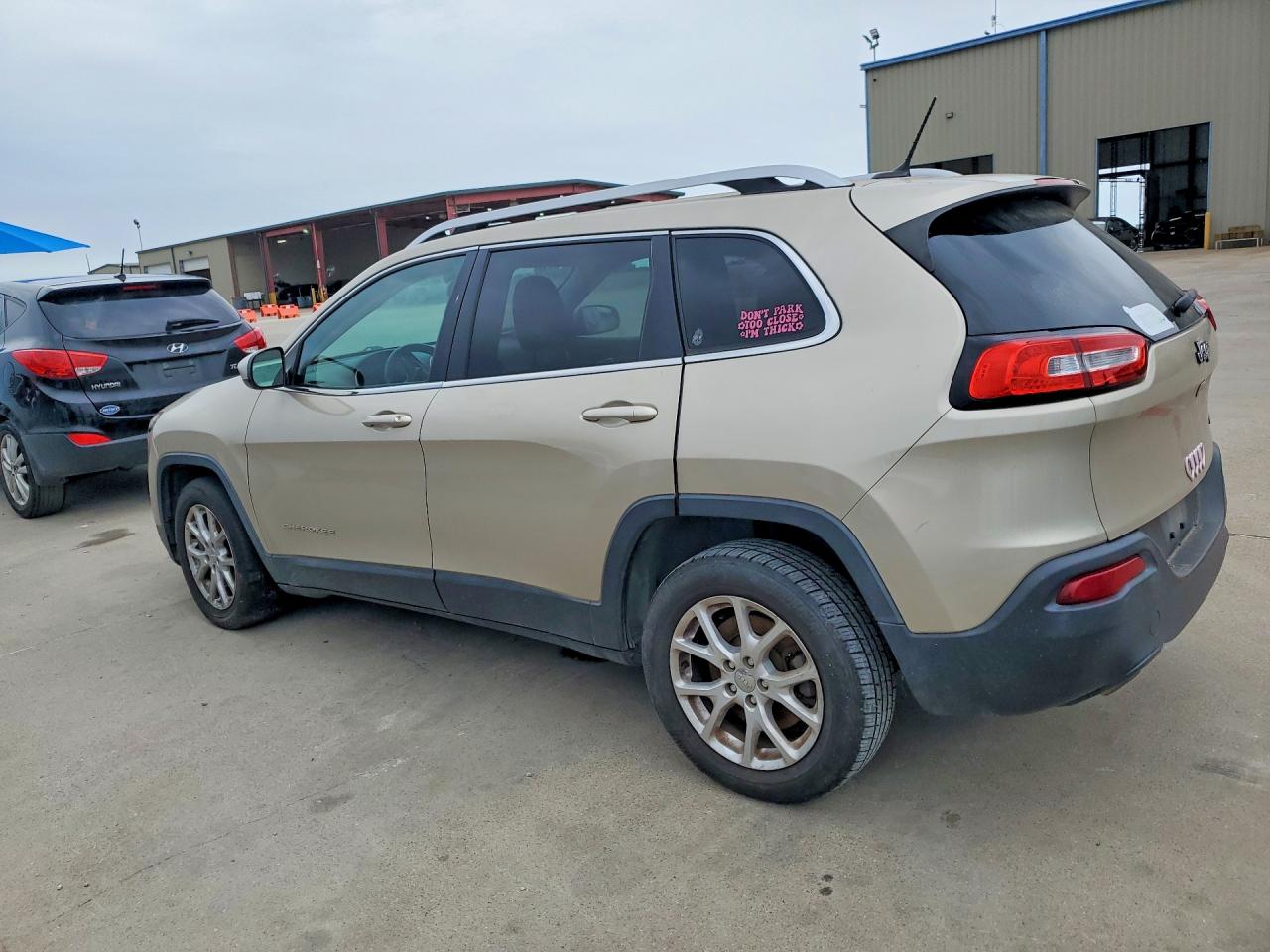 2014 Jeep Cherokee Latitude Золотой vin: 1C4PJLCS2EW297397
