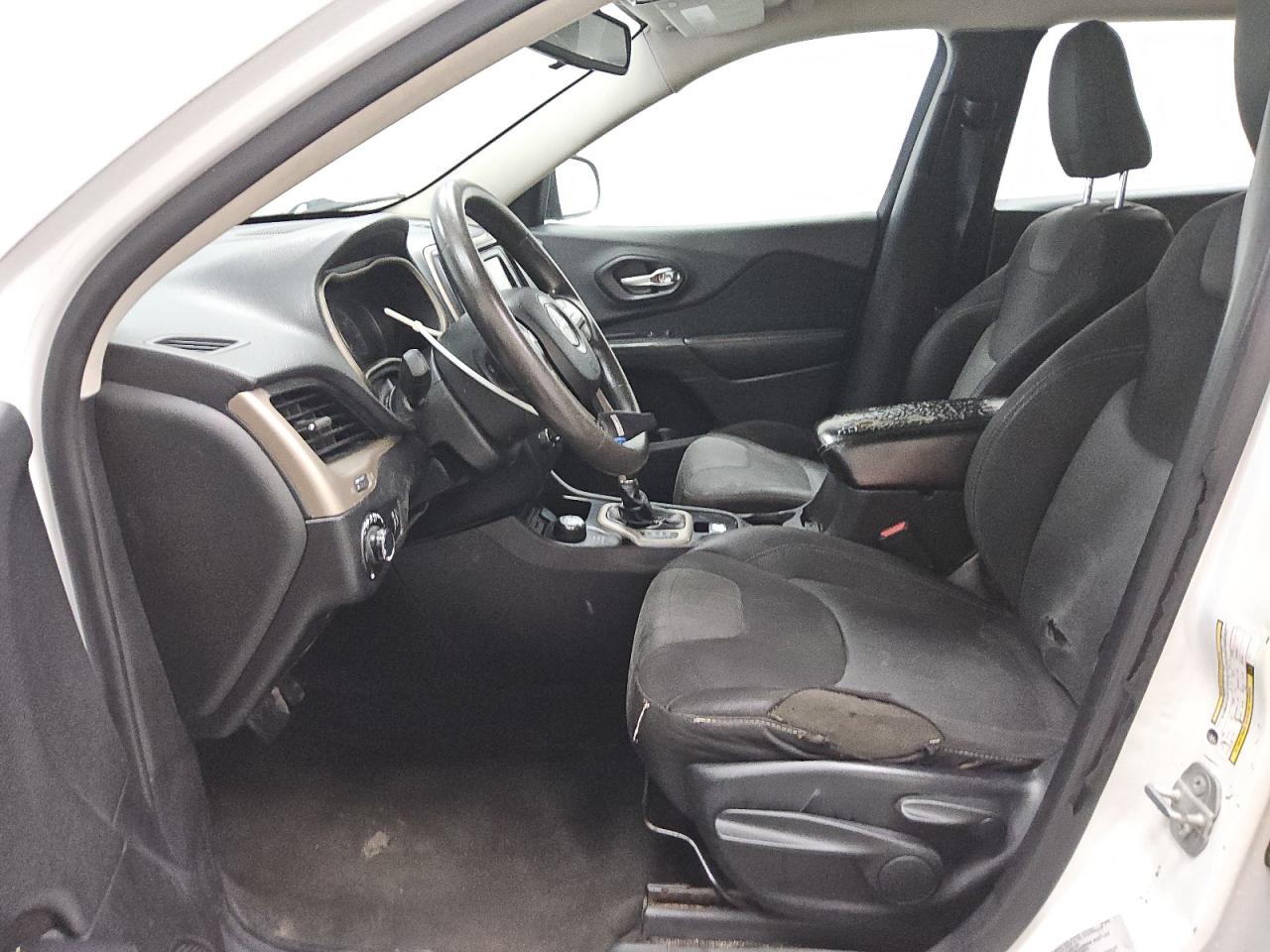 2015 Jeep Cherokee Sport White vin: 1C4PJMAB6FW792082 Damage: Left Front Carpet, Worn, Replacement Required