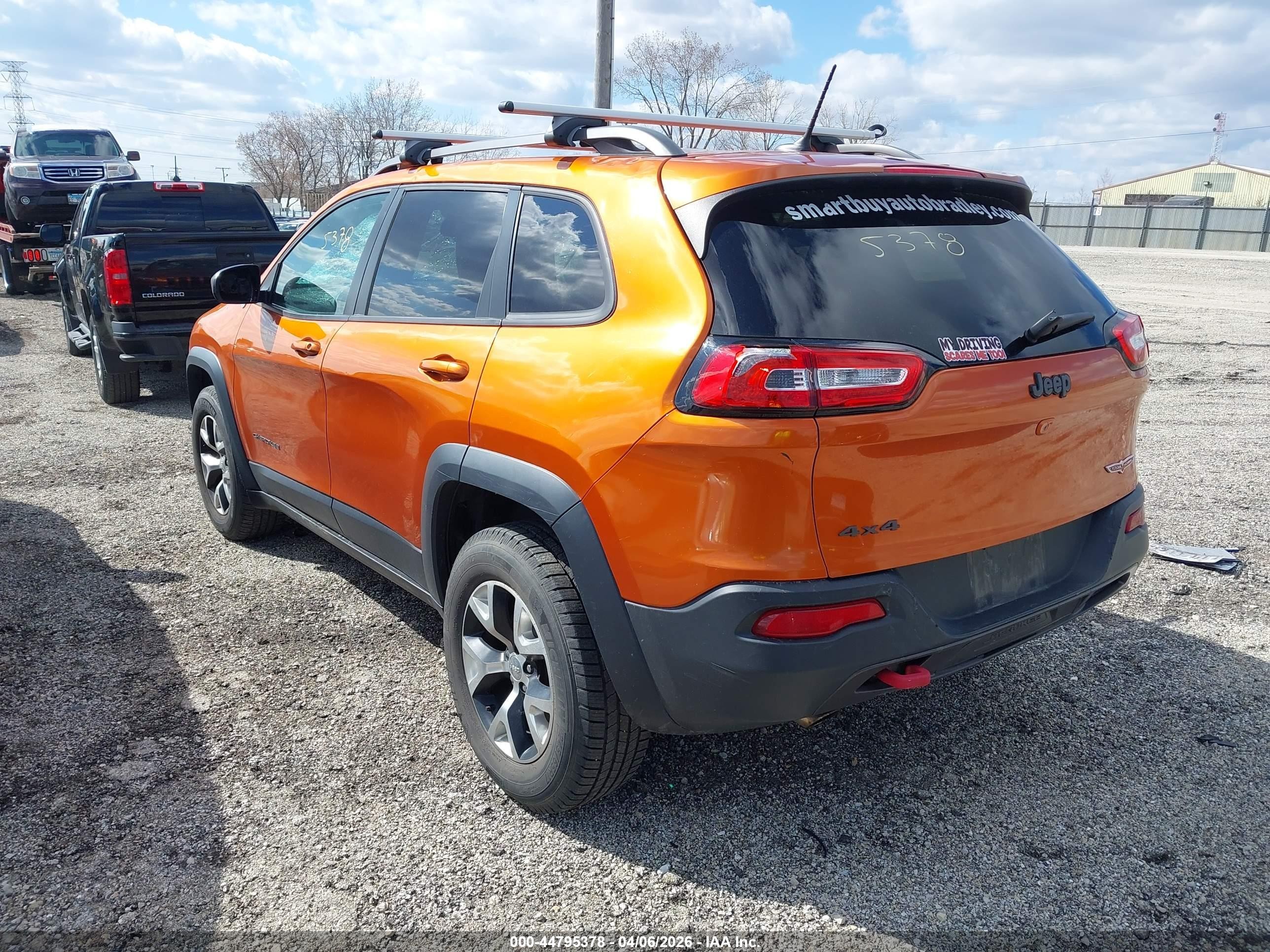2015 Jeep Cherokee Trailhawk Orange vin: 1C4PJMBBXFW576847