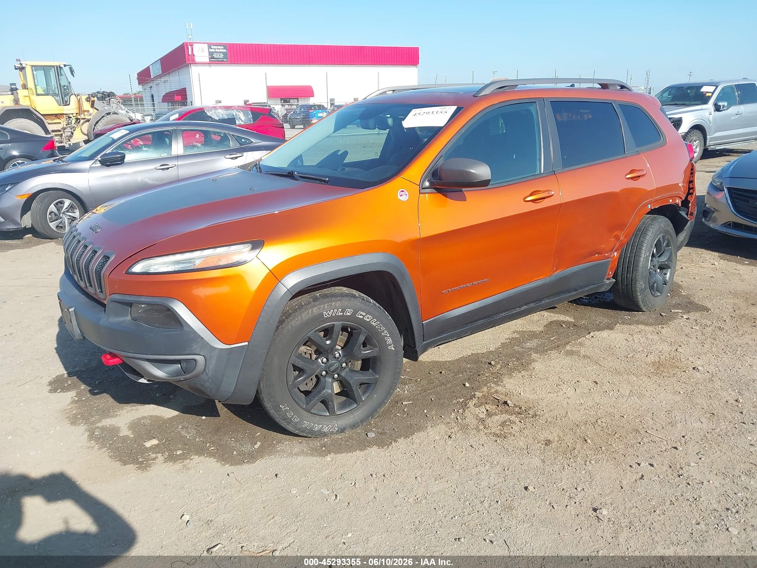 2015 Jeep Cherokee Trailhawk Orange vin: 1C4PJMBBXFW727508
