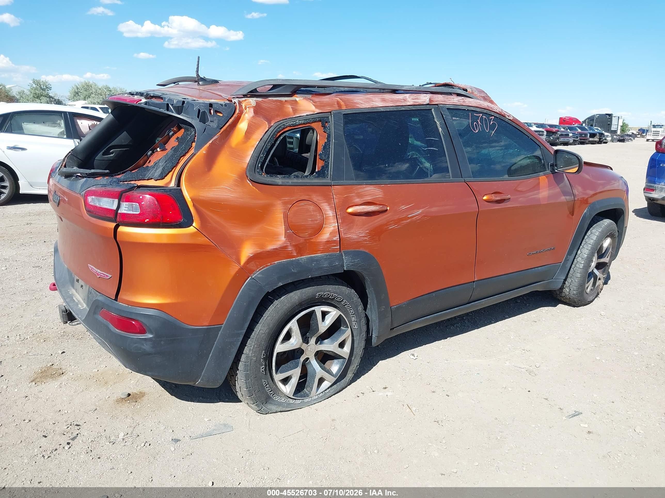 2015 Jeep Cherokee Trailhawk Orange vin: 1C4PJMBS0FW521095