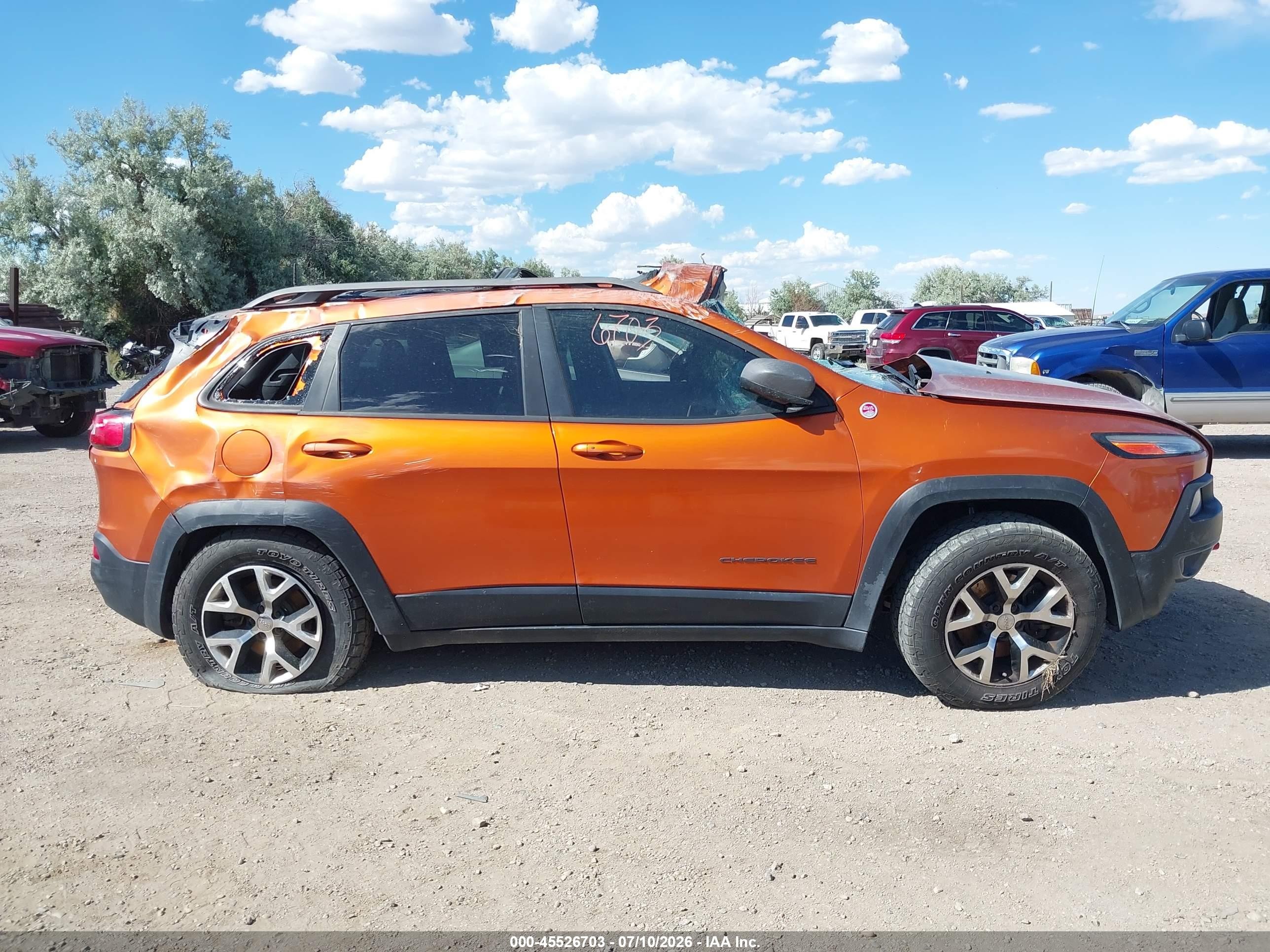 2015 Jeep Cherokee Trailhawk Orange vin: 1C4PJMBS0FW521095