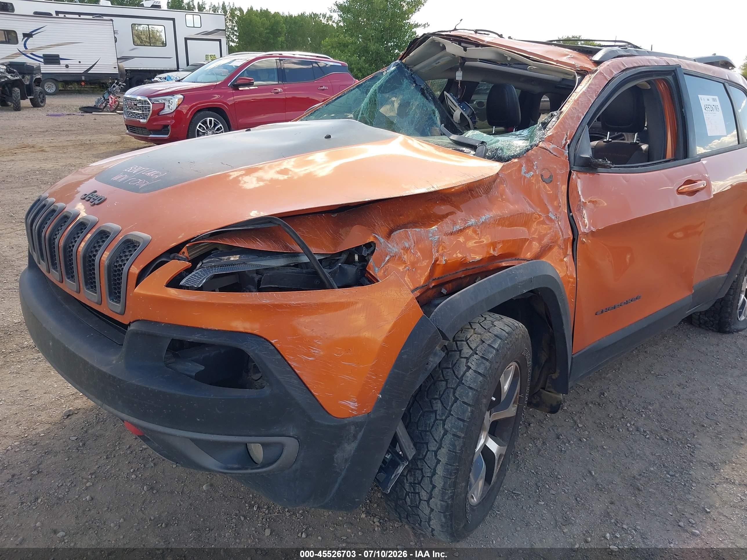 2015 Jeep Cherokee Trailhawk Orange vin: 1C4PJMBS0FW521095