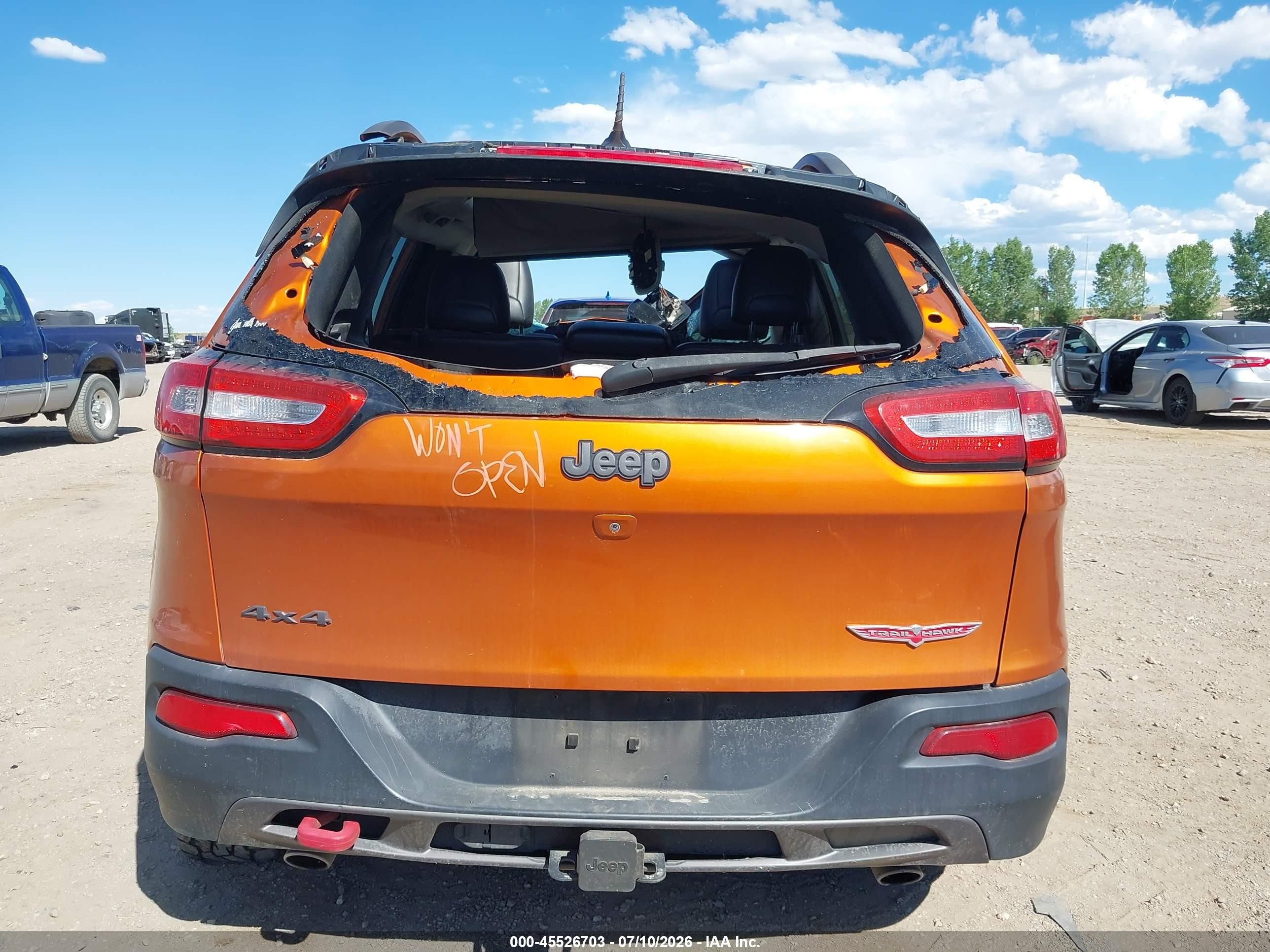 2015 Jeep Cherokee Trailhawk Orange vin: 1C4PJMBS0FW521095