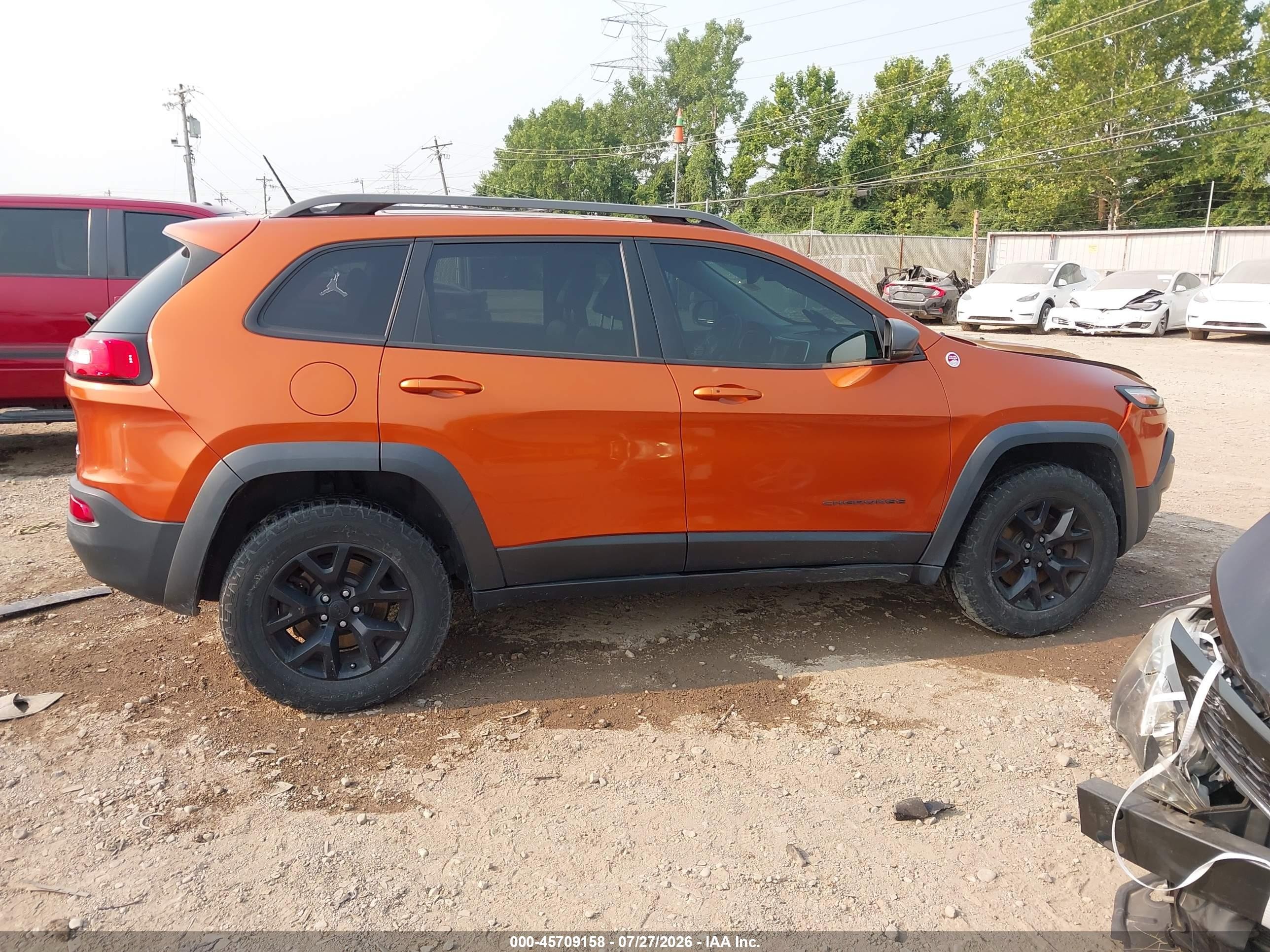 2015 Jeep Cherokee Trailhawk Orange vin: 1C4PJMBS2FW640024