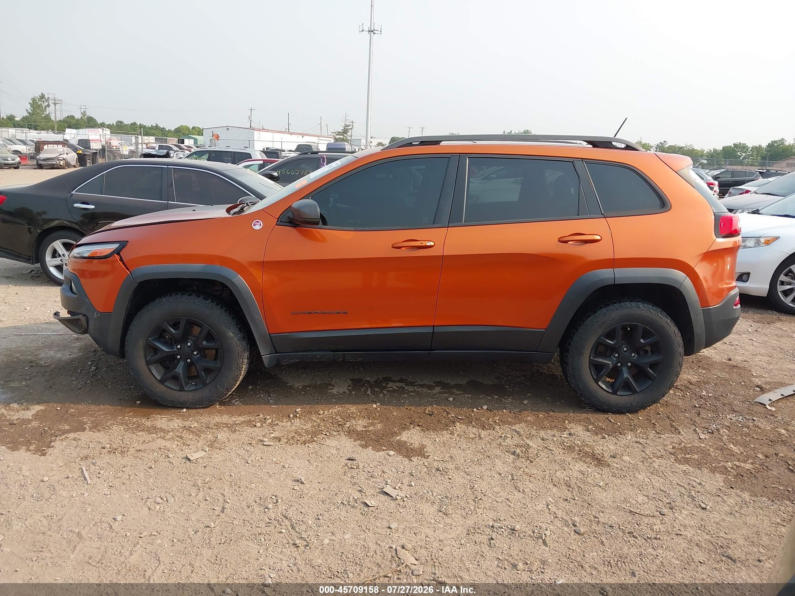 2015 Jeep Cherokee Trailhawk Orange vin: 1C4PJMBS2FW640024