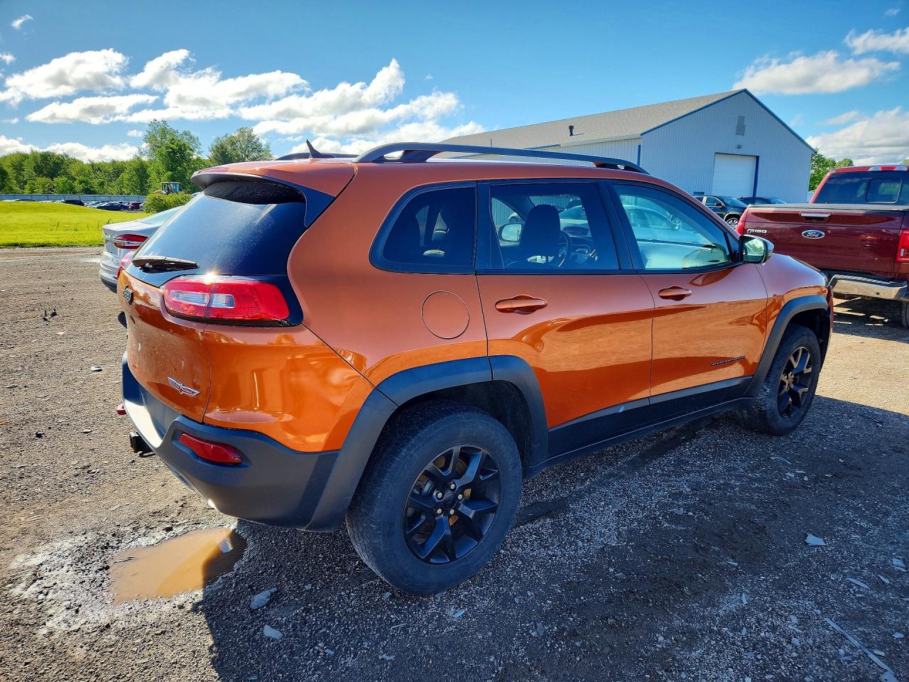 2015 Jeep Cherokee Trailhawk Orange vin: 1C4PJMBS5FW576562