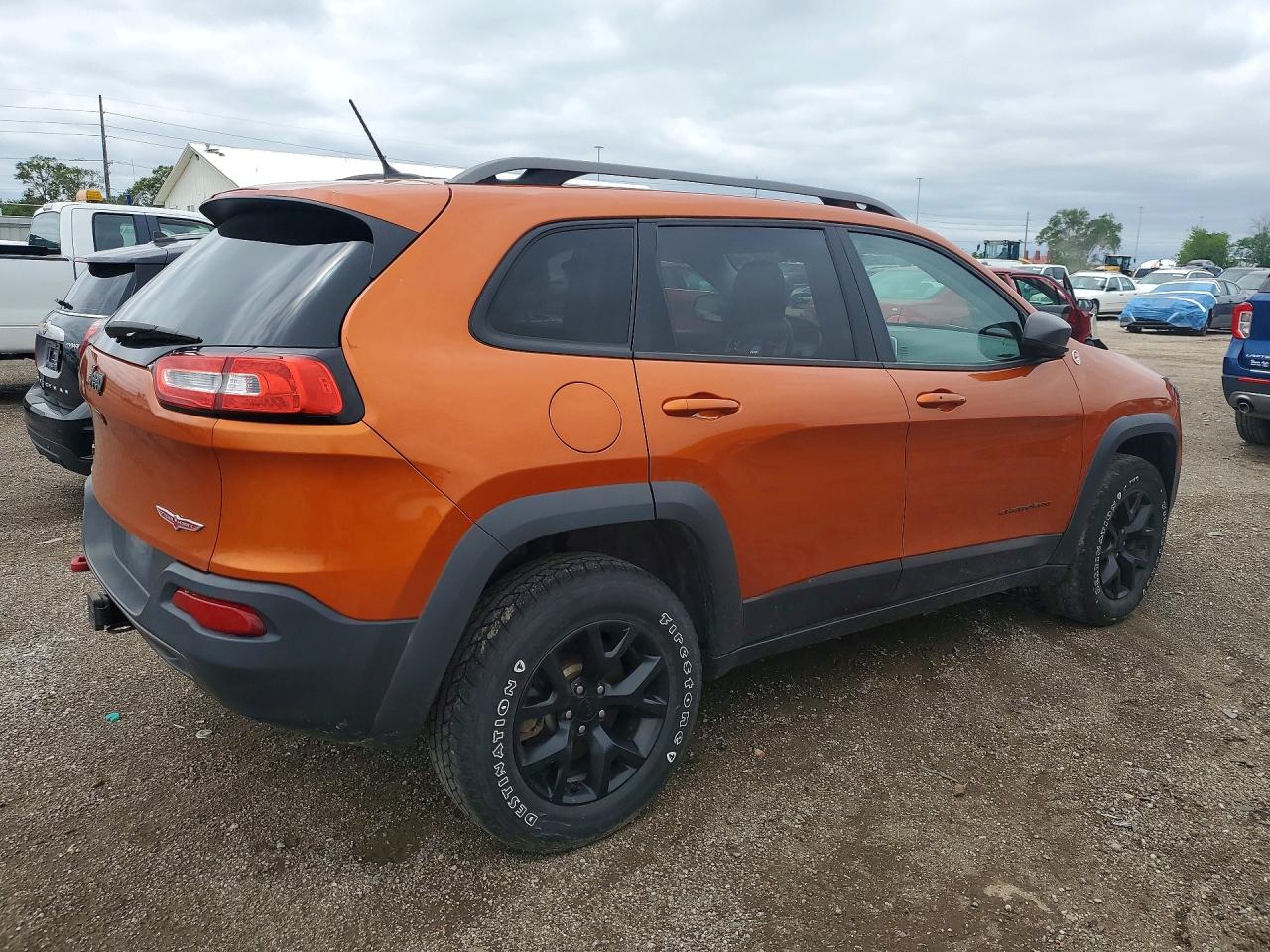 2015 Jeep Cherokee Trailhawk Orange vin: 1C4PJMBS6FW503118