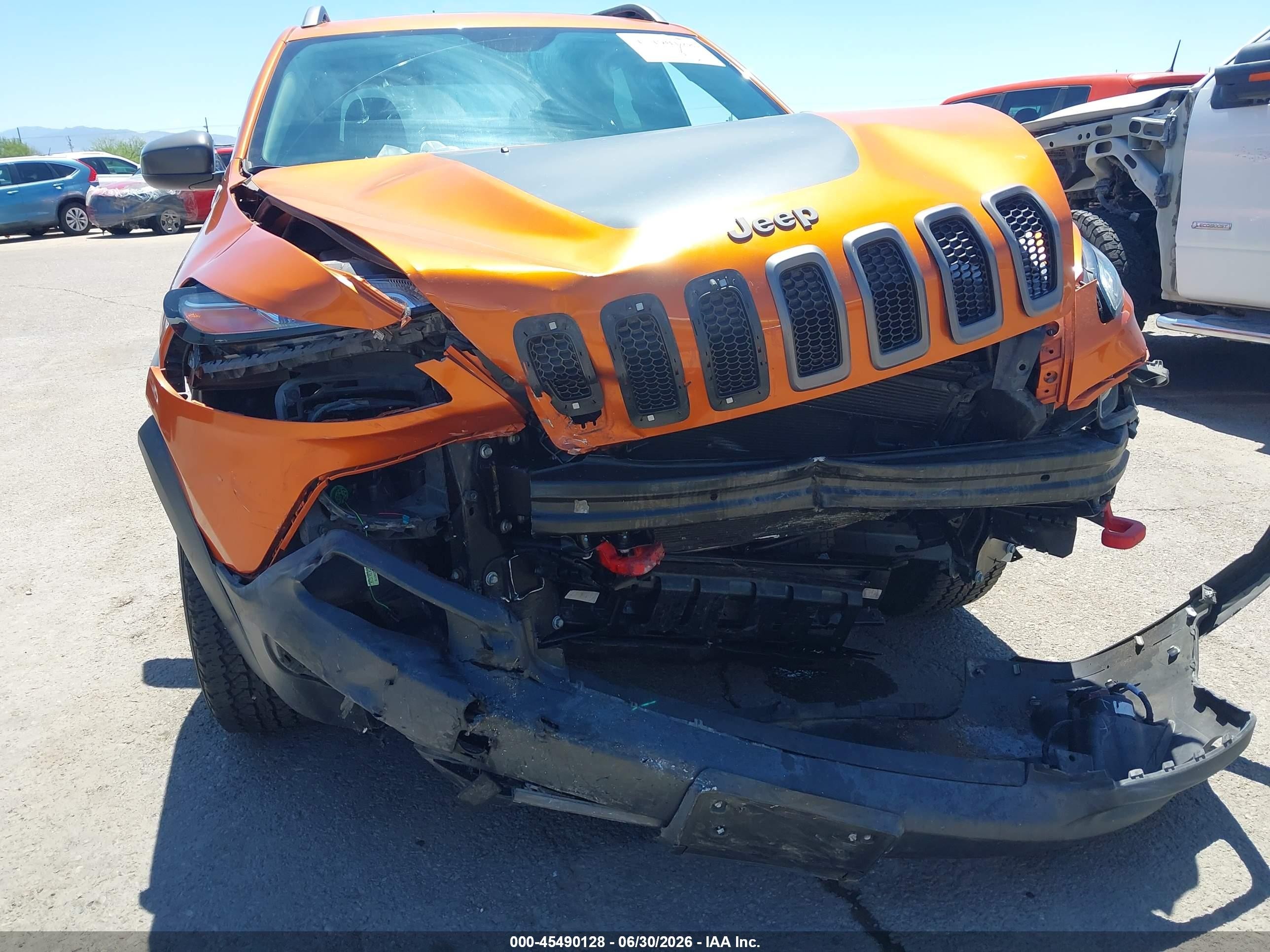 2015 Jeep Cherokee Trailhawk Orange vin: 1C4PJMBS8FW693973