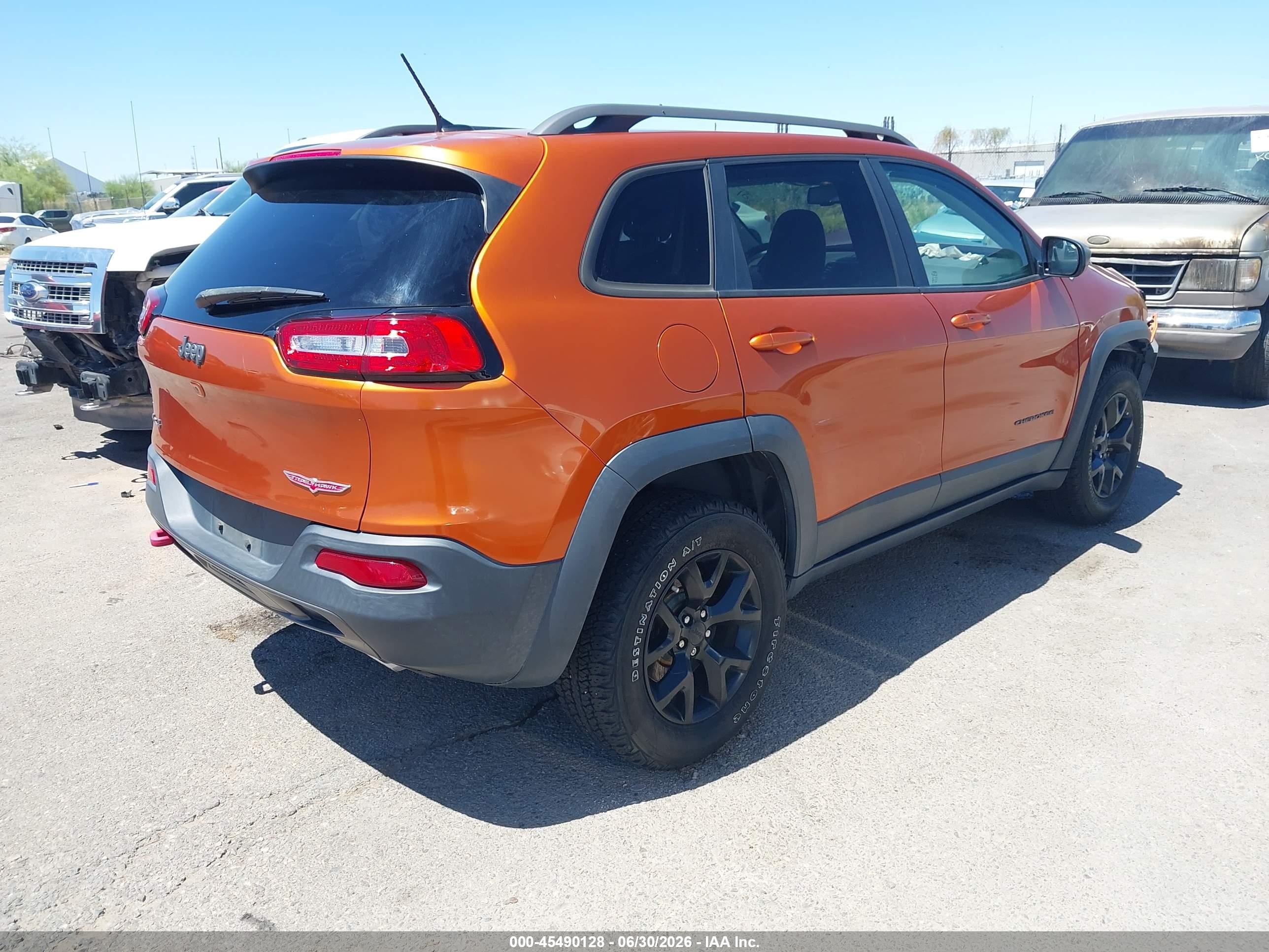 2015 Jeep Cherokee Trailhawk Orange vin: 1C4PJMBS8FW693973