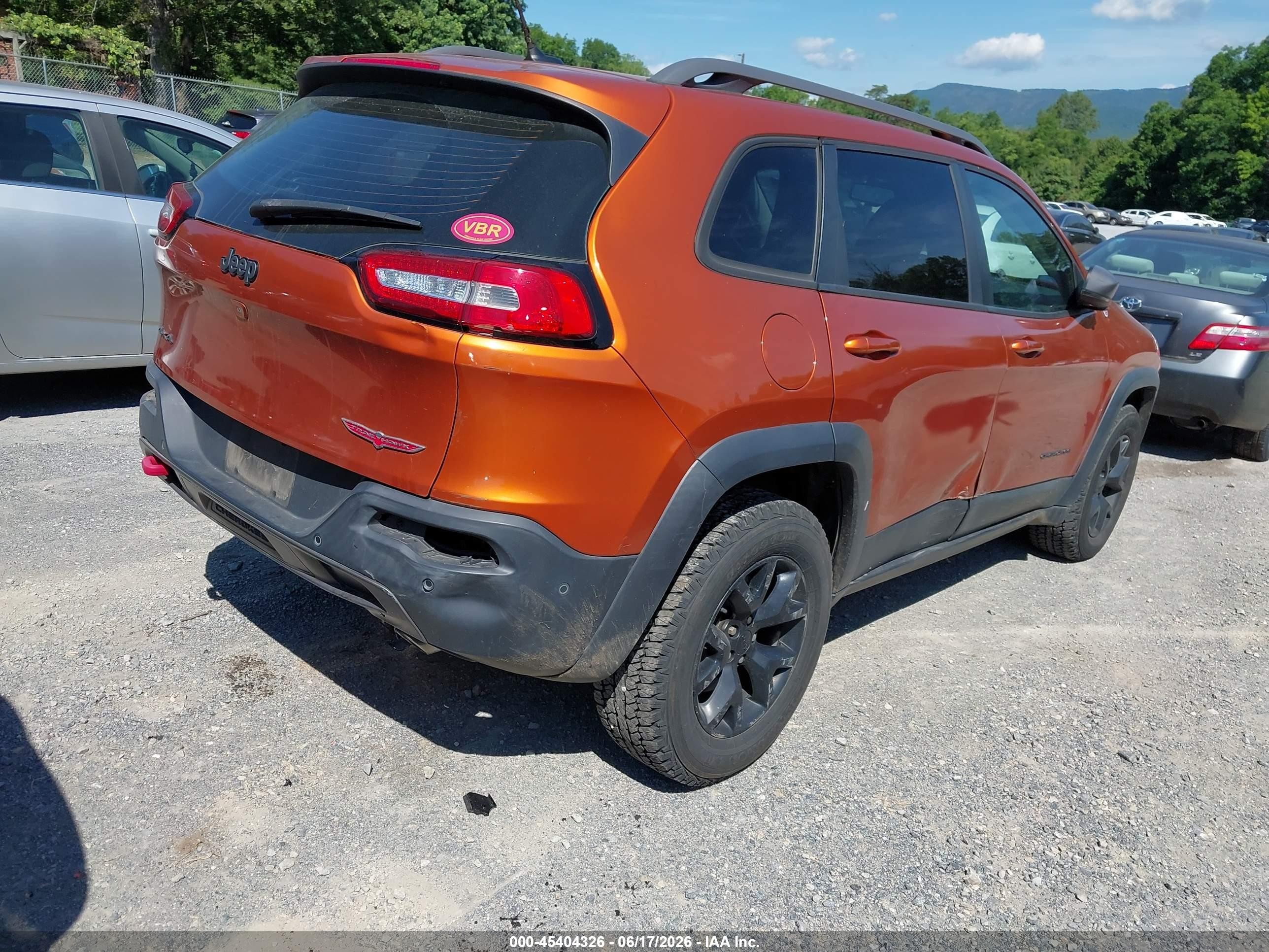 2015 Jeep Cherokee Trailhawk Orange vin: 1C4PJMBSXFW644063
