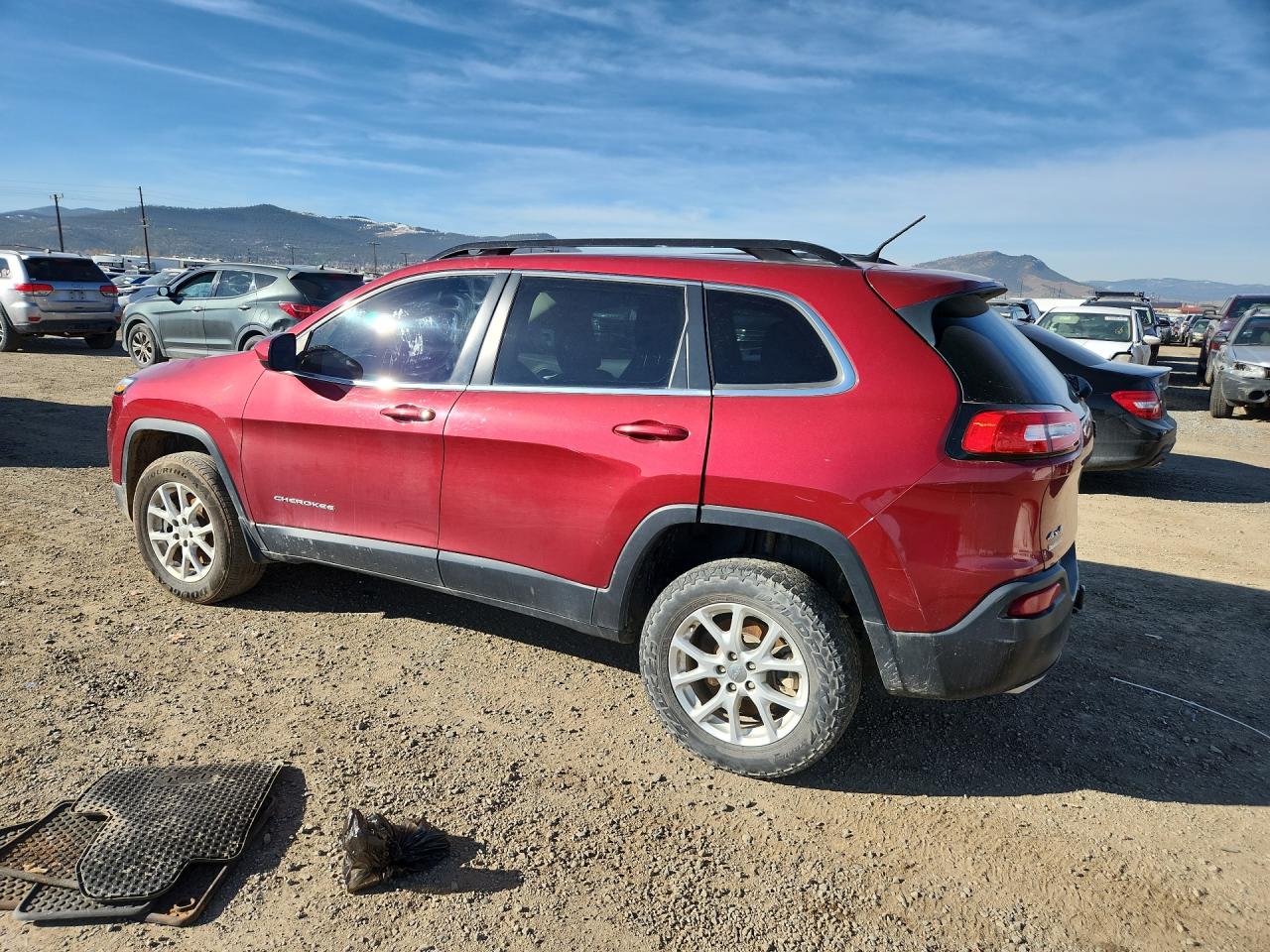 2015 Jeep Cherokee Latitude Maroon vin: 1C4PJMCSXFW601616 Damage: Left Qtr Panel, Heavy Scratch, 5 To 6 Inches