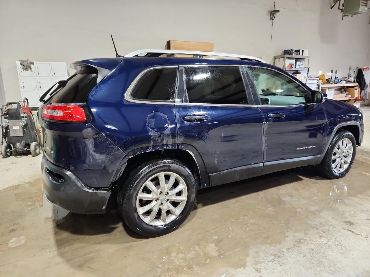 2016 Jeep Cherokee Limited Blue vin: 1C4PJMDB9GW259771 Damage: Right Rear Wheel Opening Mldg, Missing, Replacement Required