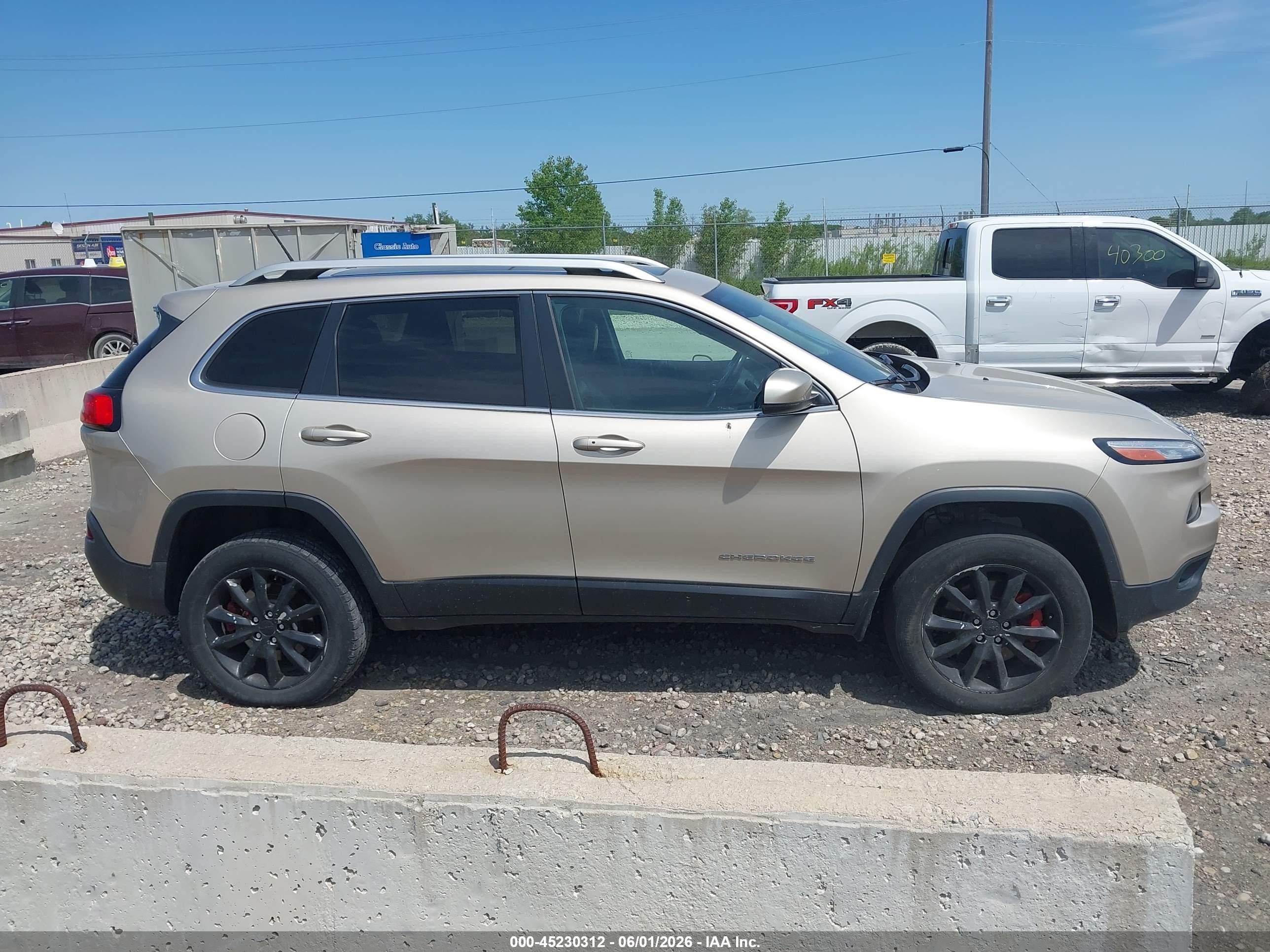 2015 Jeep Cherokee Limited Gold vin: 1C4PJMDS3FW558297