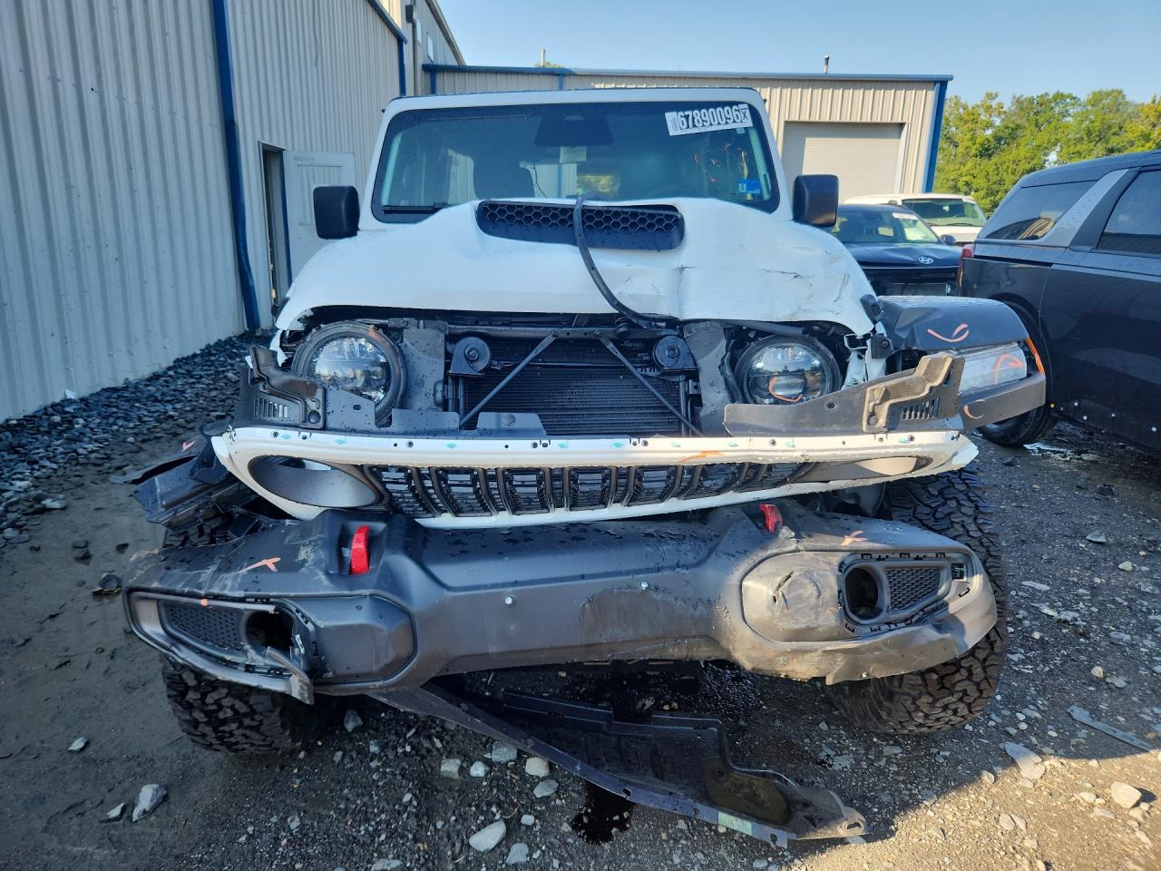 2026 Jeep Wrangler Rubicon White vin: 1C4PJXFN9TW286312 Damage: Front Bumper Molding, Broken, Replacement Required
