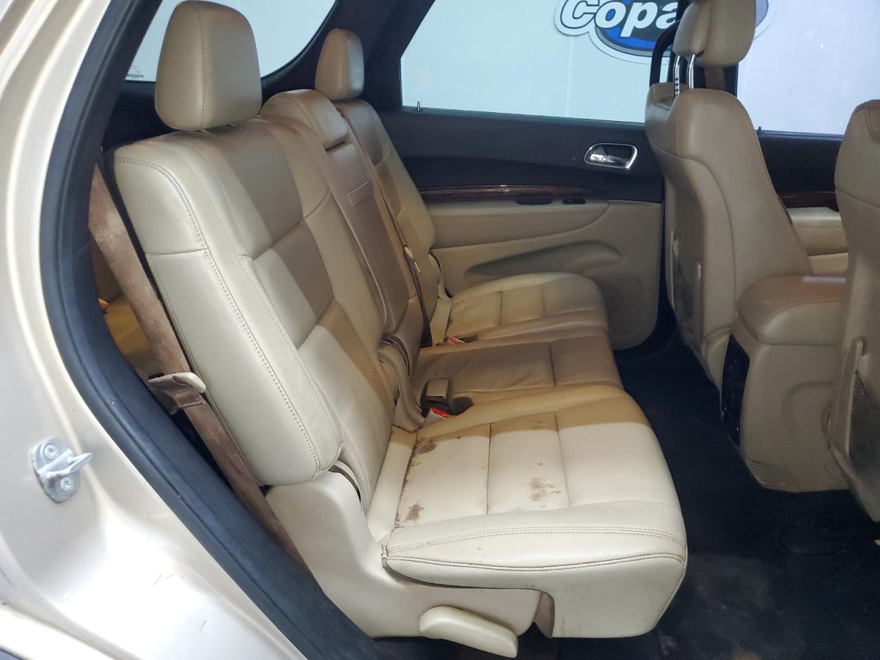 2014 Dodge Durango Limited Gold vin: 1C4RDHDG7EC520266 Damage: Right Rear Seat Cushion, Stained, Permanent