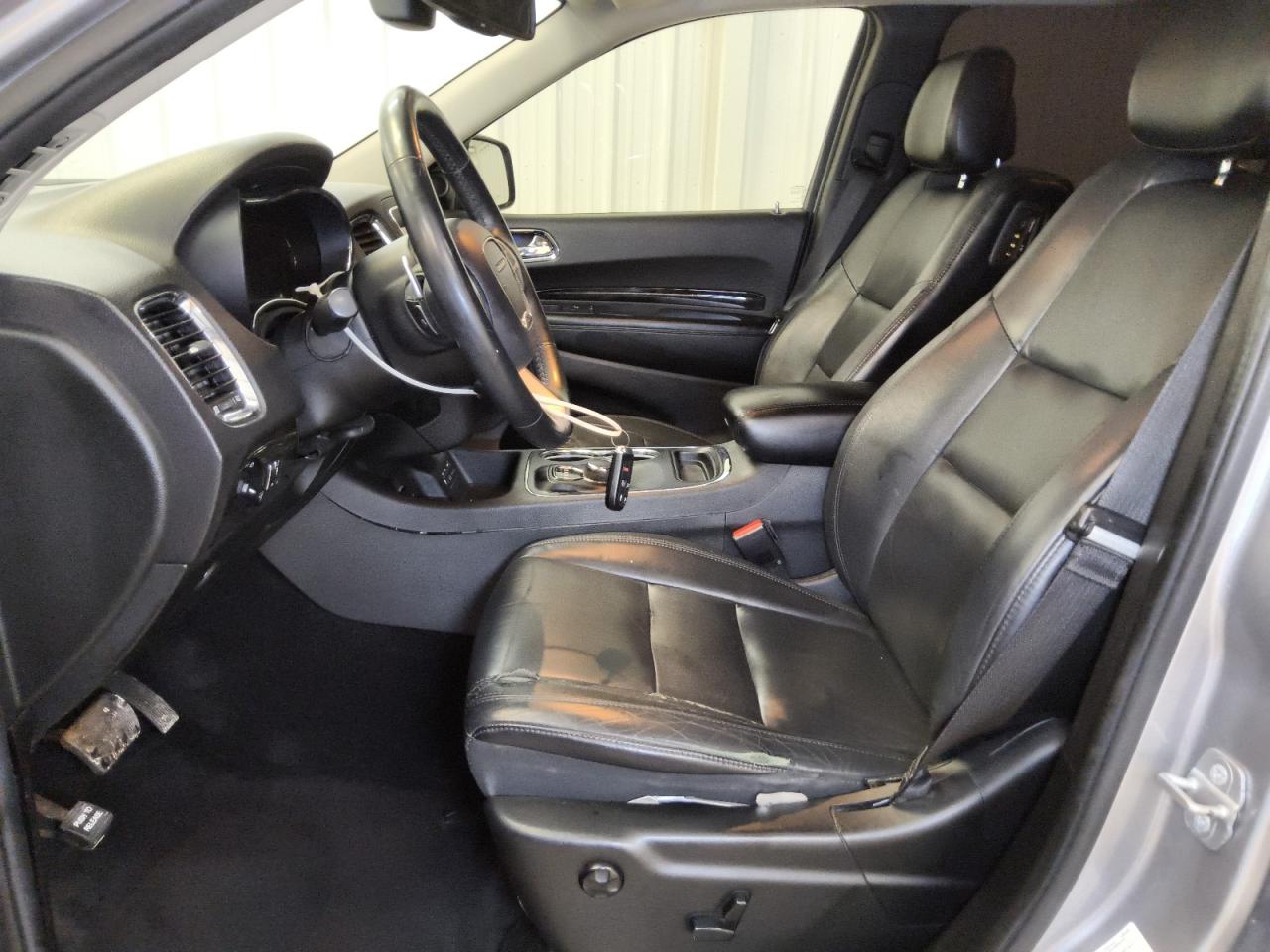 2014 Dodge Durango Limited Silver vin: 1C4RDHDG8EC266793 Damage: Left Front Seat Cushion, Torn, > 12 Inches