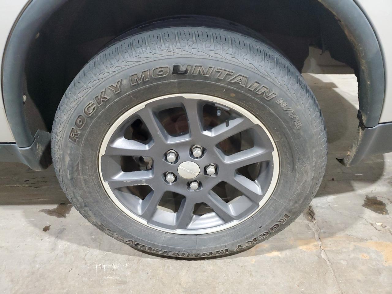 2012 Dodge Durango Sxt Silver vin: 1C4RDJAG4CC312435 Damage: Left Rear Tire, Worn, Replacement Required