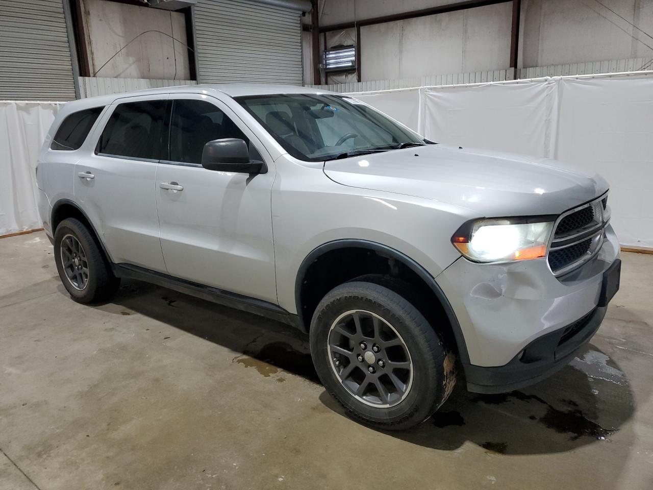 2012 Dodge Durango Sxt Silver vin: 1C4RDJAG4CC312435 Damage: Front Bumper, Dent(S) W/ Paint Dmg, > 12 Inches