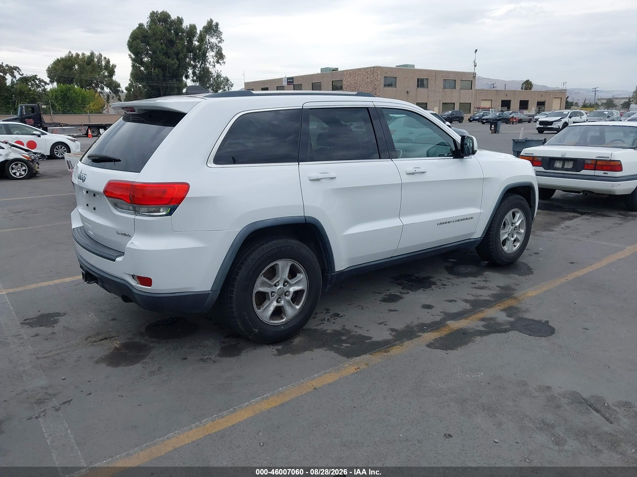 2015 Jeep Grand Cherokee Laredo Белый vin: 1C4RJEAG0FC654274