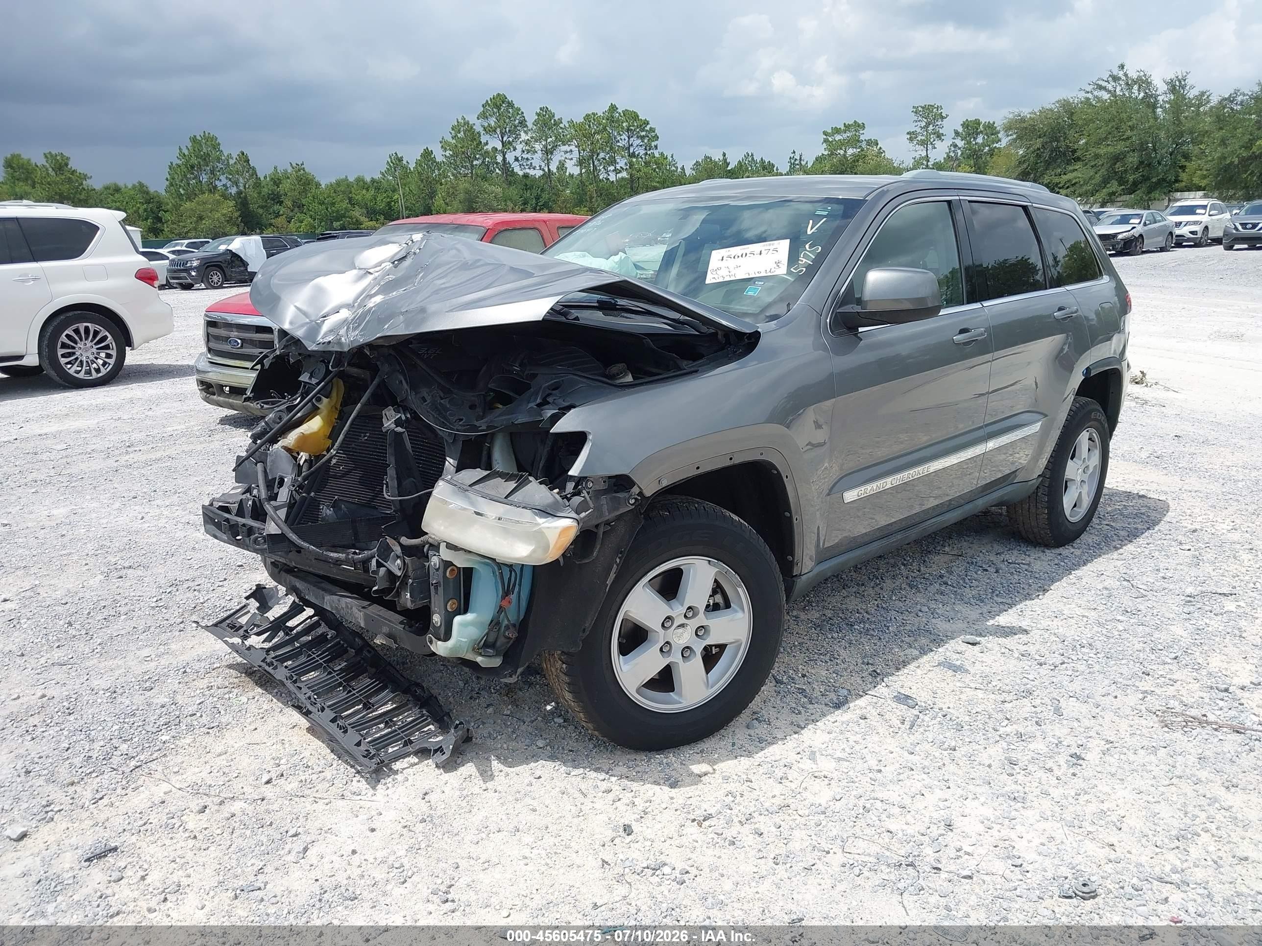 2012 Jeep Grand Cherokee Laredo Серый vin: 1C4RJEAG2CC215265