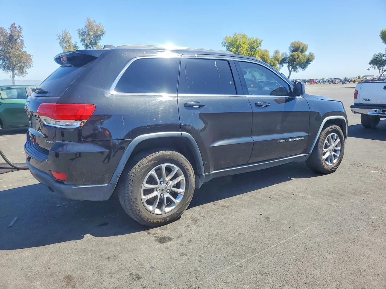 2015 Jeep Grand Cherokee Laredo Черный vin: 1C4RJEAG2FC895284