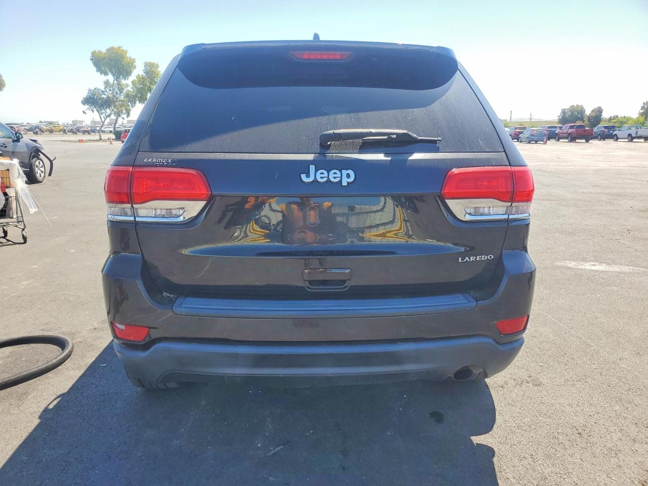 2015 Jeep Grand Cherokee Laredo Черный vin: 1C4RJEAG2FC895284