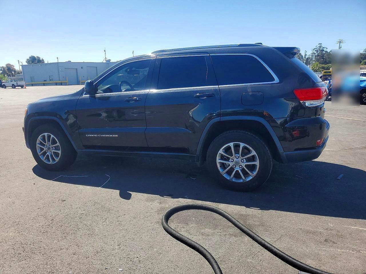 2015 Jeep Grand Cherokee Laredo Черный vin: 1C4RJEAG2FC895284