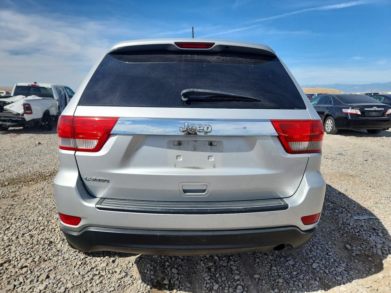 2012 Jeep Grand Cherokee Laredo Серебряный vin: 1C4RJEAG4CC151147