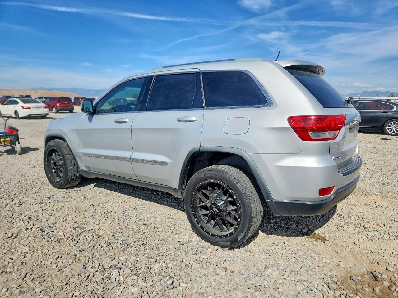 2012 Jeep Grand Cherokee Laredo Серебряный vin: 1C4RJEAG4CC151147