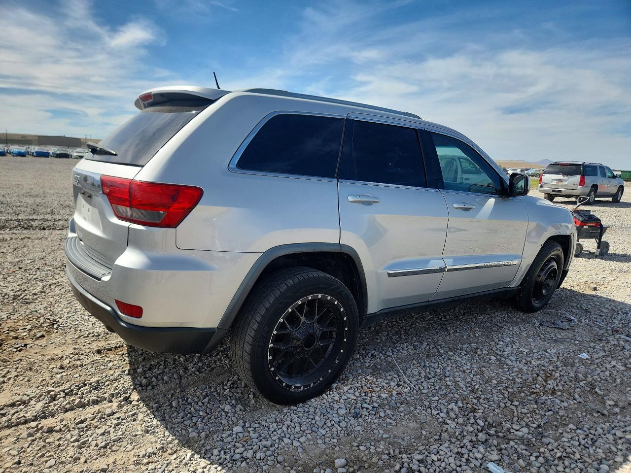 2012 Jeep Grand Cherokee Laredo Серебряный vin: 1C4RJEAG4CC151147
