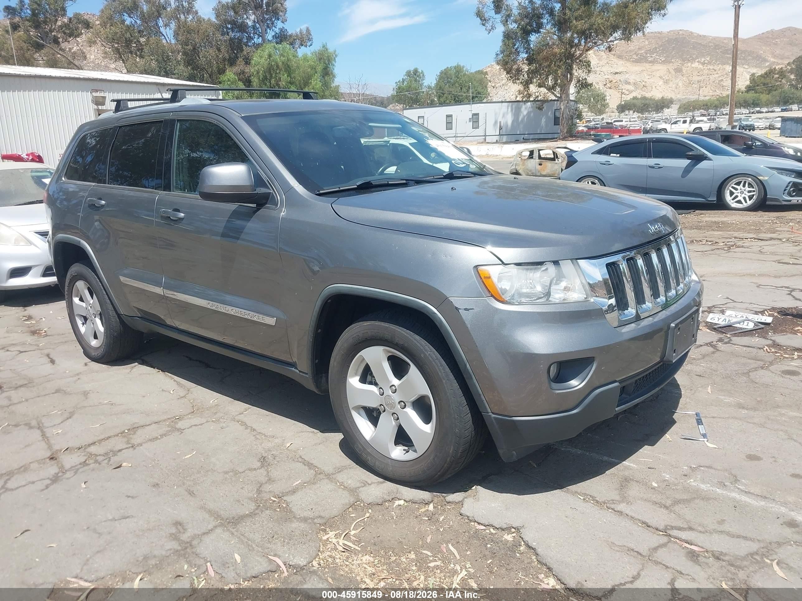 2012 Jeep Grand Cherokee Laredo Серый vin: 1C4RJEAG4CC229393