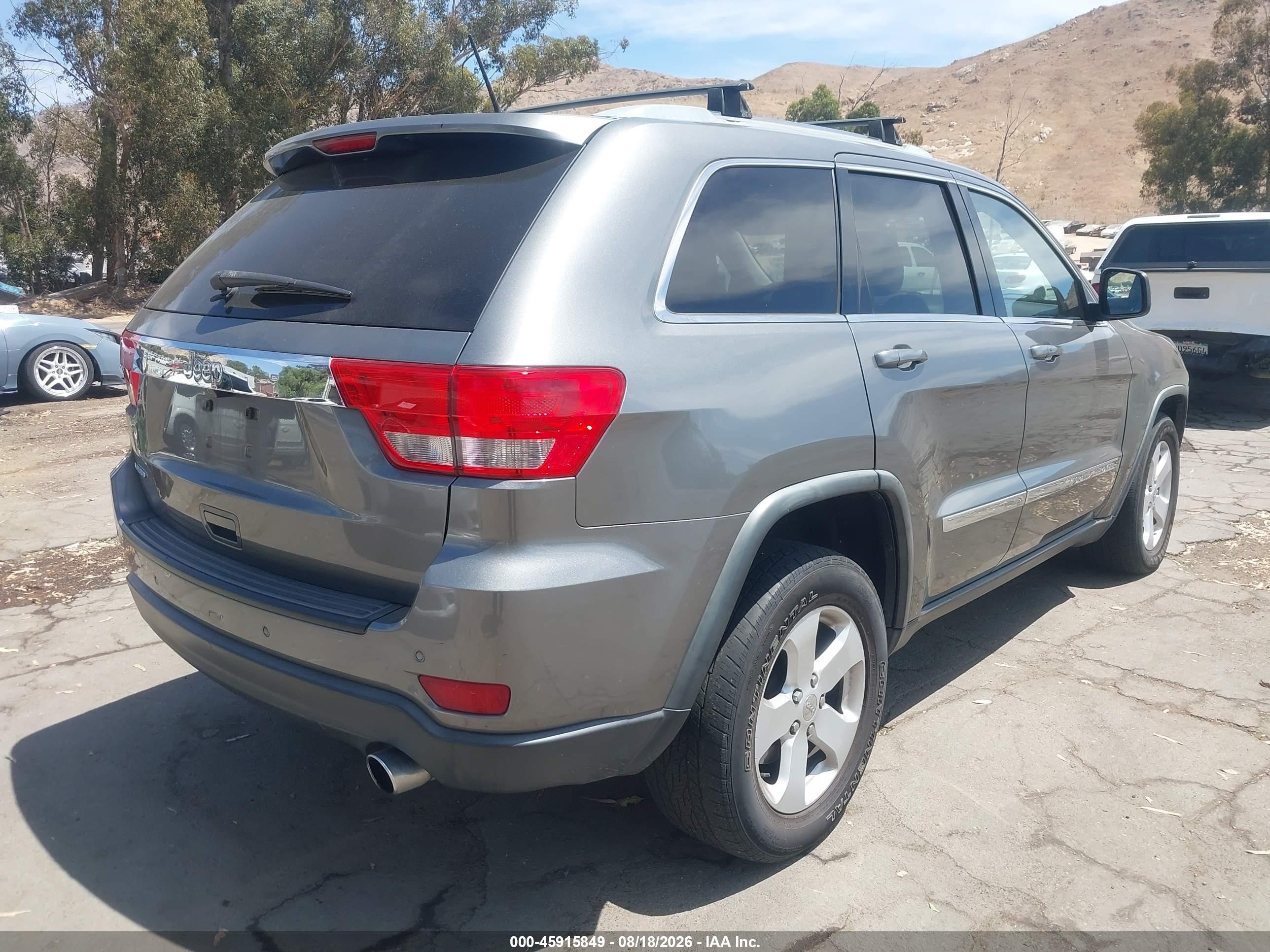 2012 Jeep Grand Cherokee Laredo Серый vin: 1C4RJEAG4CC229393