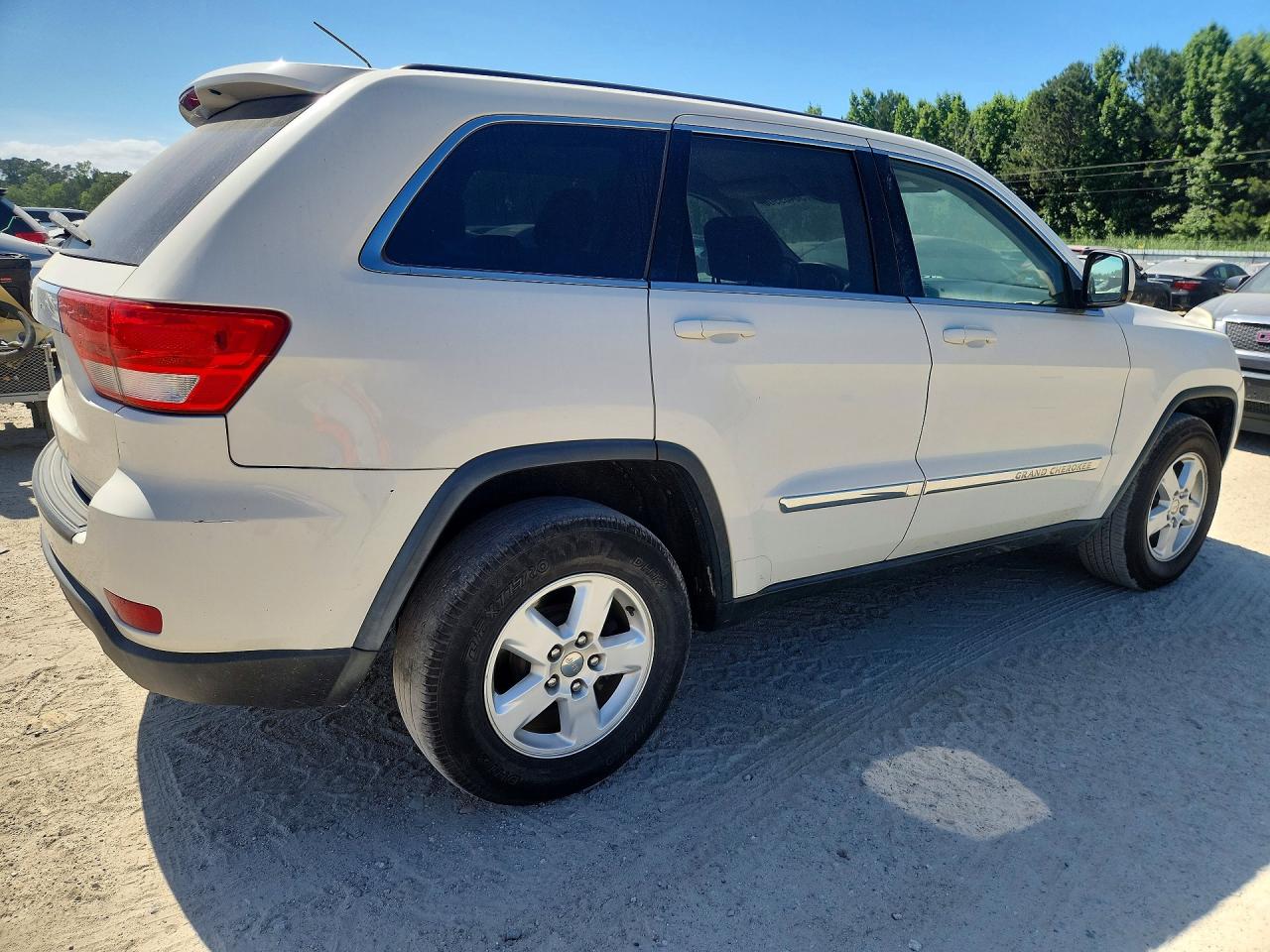 2012 Jeep Grand Cherokee Laredo Белый vin: 1C4RJEAG4CC355821