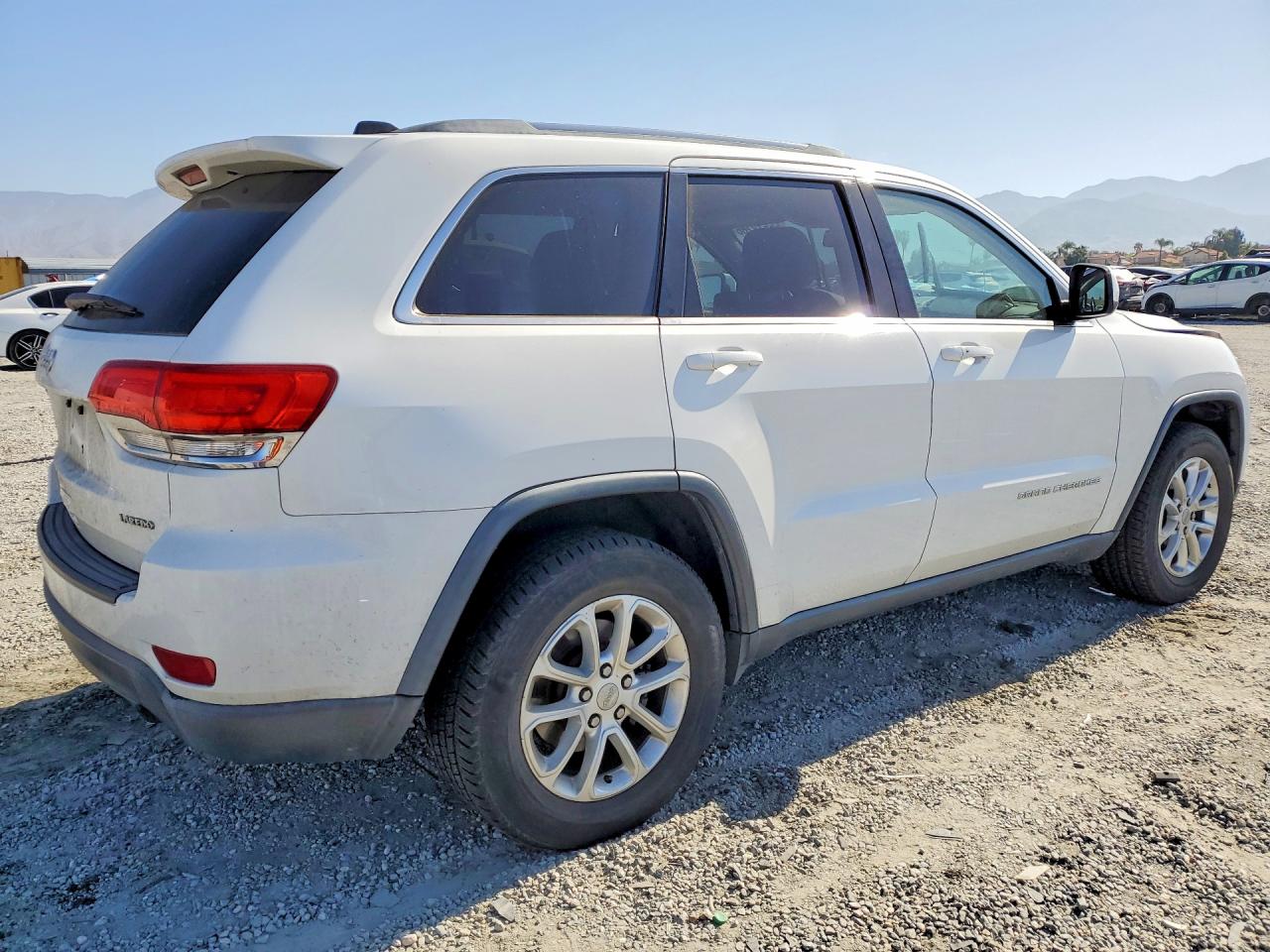2015 Jeep Grand Cherokee Laredo Белый vin: 1C4RJEAG4FC669571
