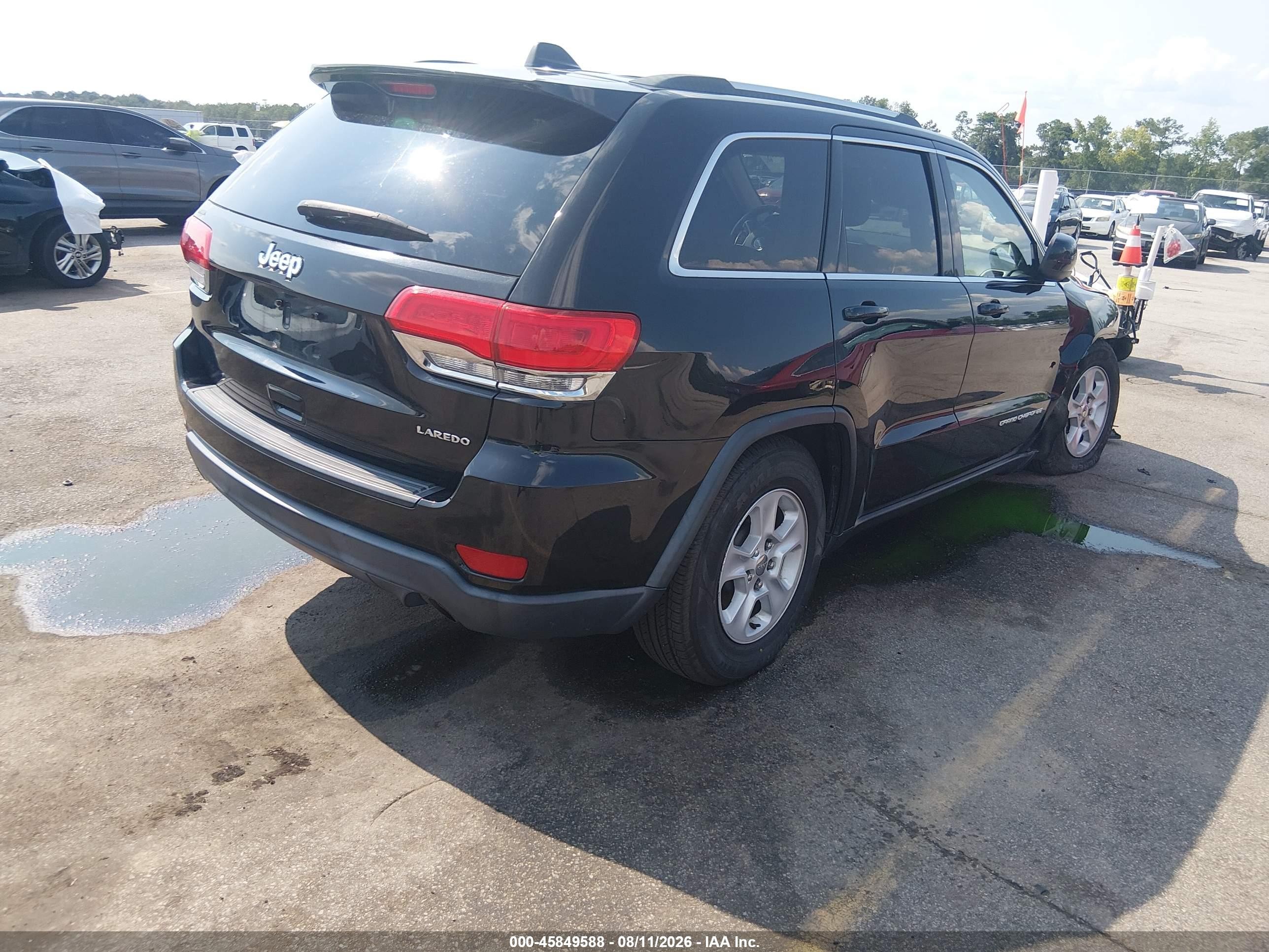 2015 Jeep Grand Cherokee Laredo Черный vin: 1C4RJEAG4FC857071