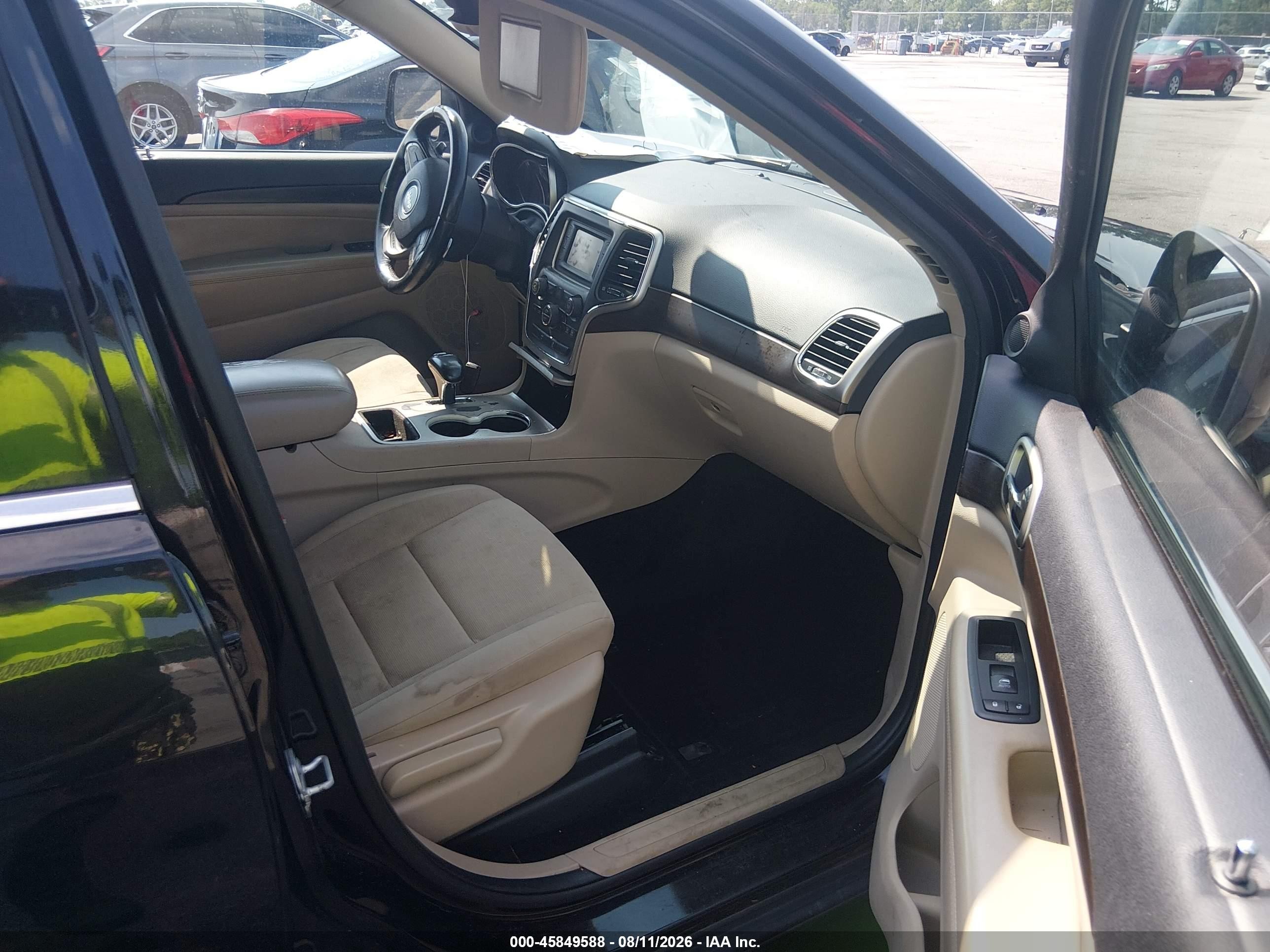 2015 Jeep Grand Cherokee Laredo Черный vin: 1C4RJEAG4FC857071