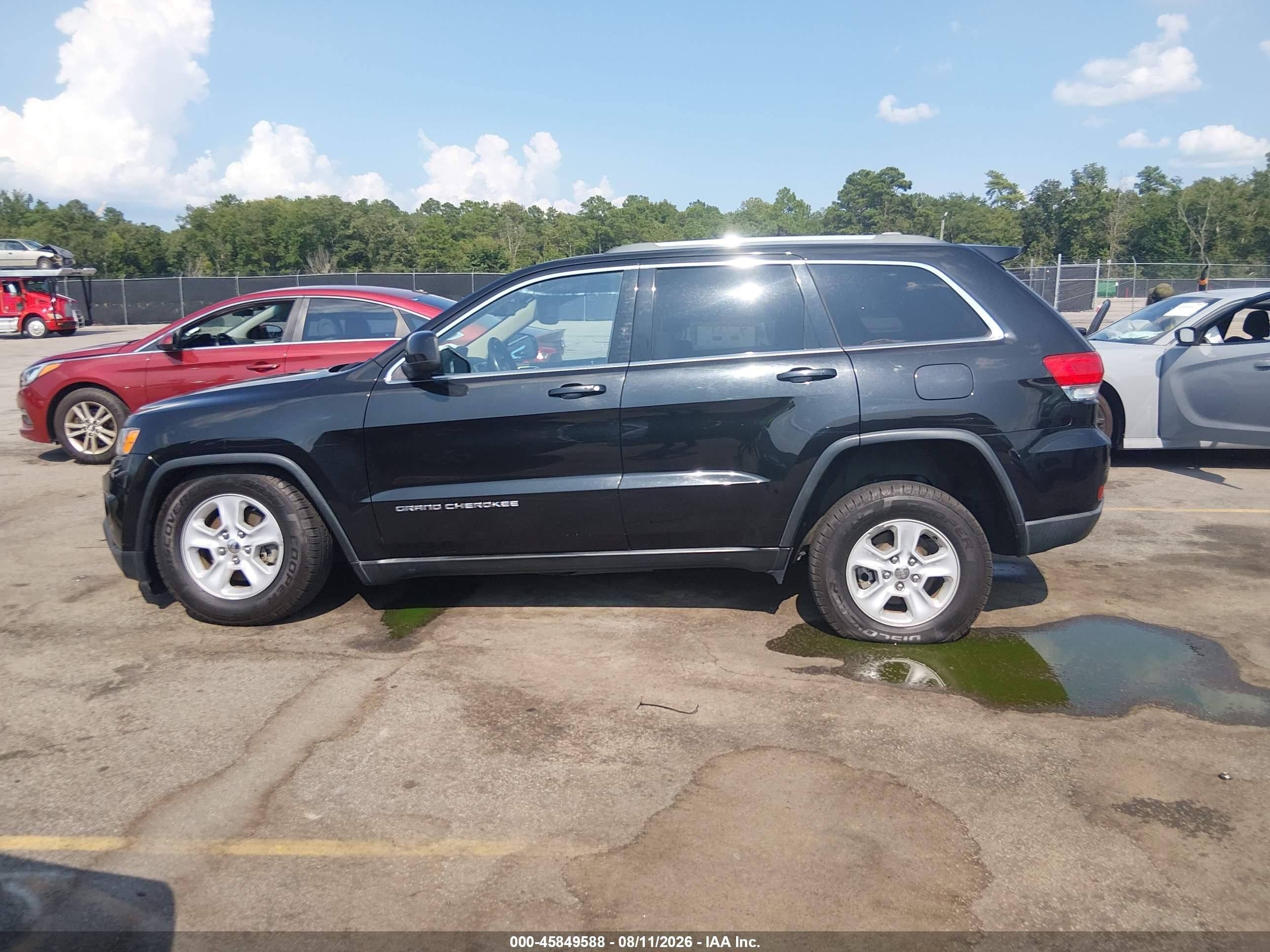 2015 Jeep Grand Cherokee Laredo Черный vin: 1C4RJEAG4FC857071