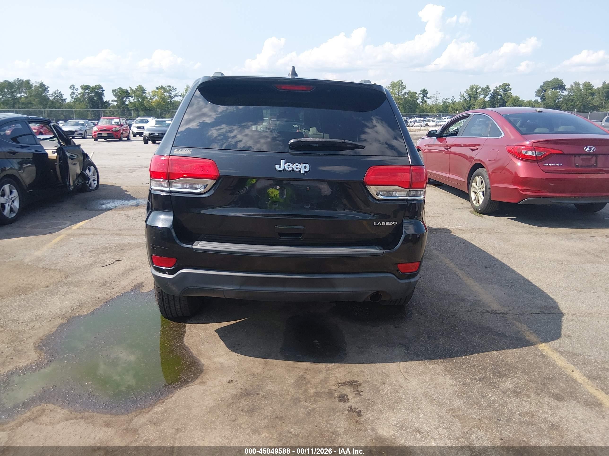 2015 Jeep Grand Cherokee Laredo Черный vin: 1C4RJEAG4FC857071