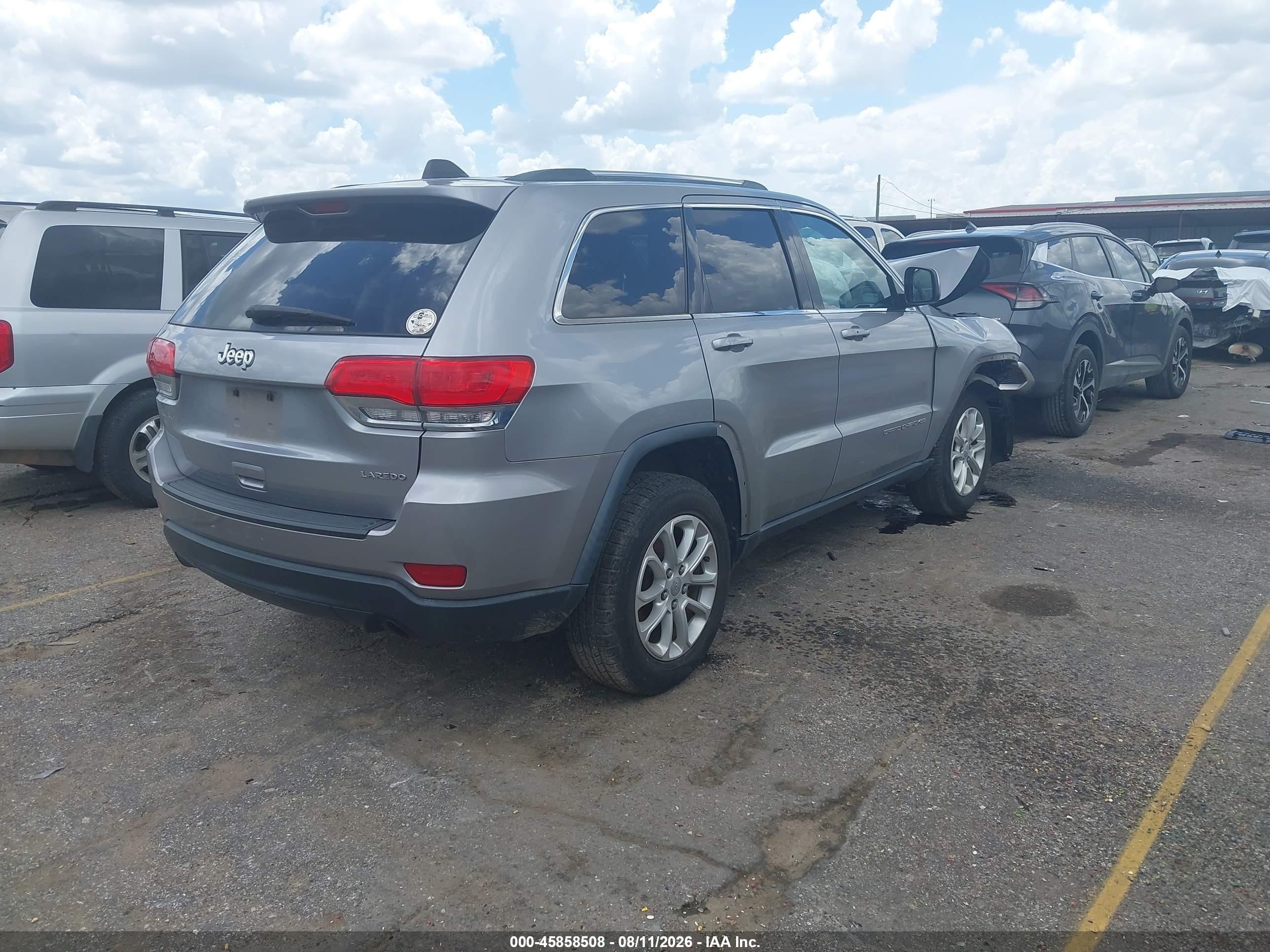 2014 Jeep Grand Cherokee Laredo Серебряный vin: 1C4RJEAG5EC412028