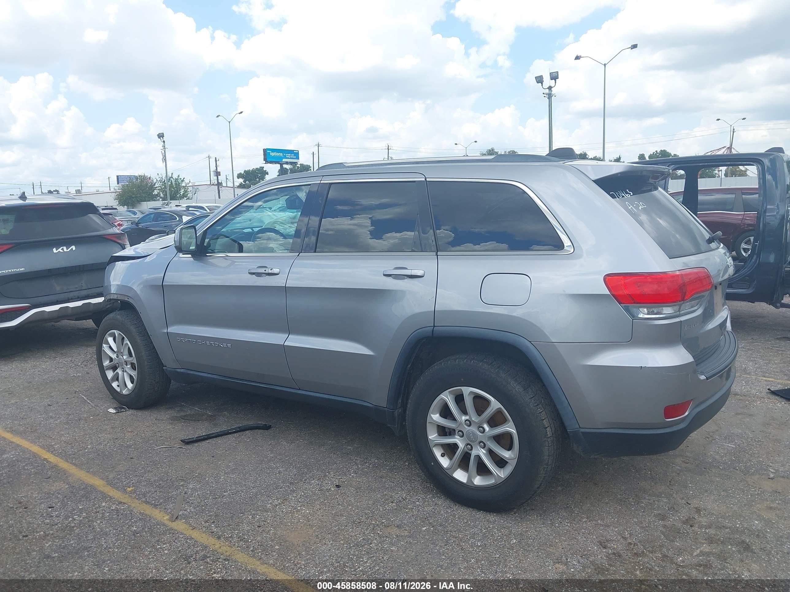 2014 Jeep Grand Cherokee Laredo Серебряный vin: 1C4RJEAG5EC412028