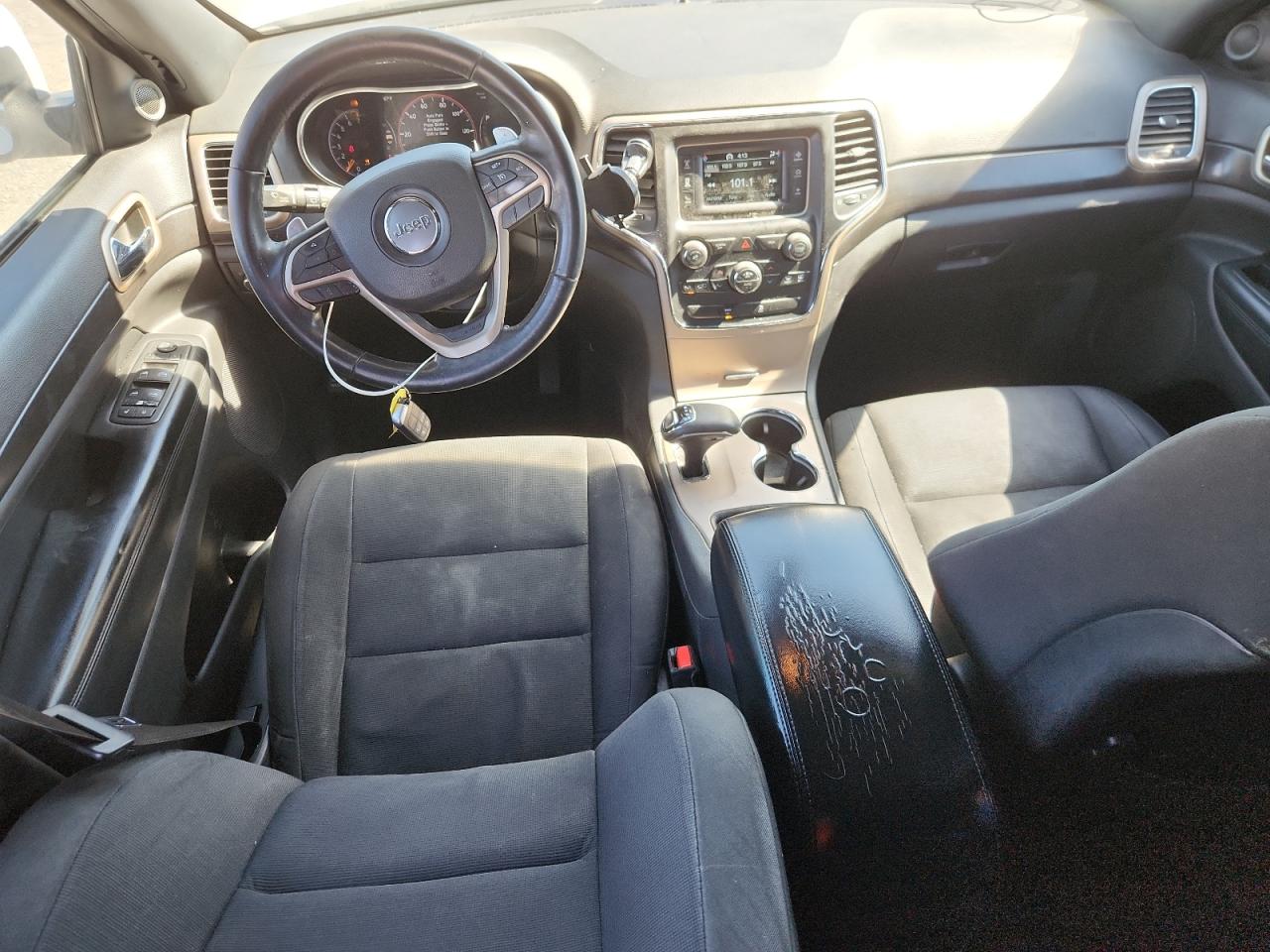 2015 Jeep Grand Cherokee Laredo White vin: 1C4RJEAG7FC152507 Damage: Console Cover, Torn, > 12 Inches