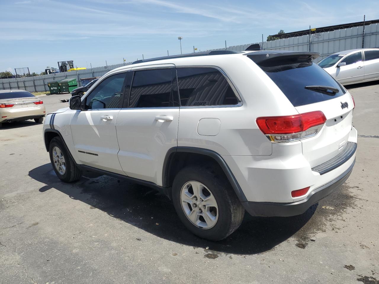 2015 Jeep Grand Cherokee Laredo White vin: 1C4RJEAG7FC152507 Damage: Left Rear Door, Dent(S) W/ Paint Dmg, 9 To 10 Inches